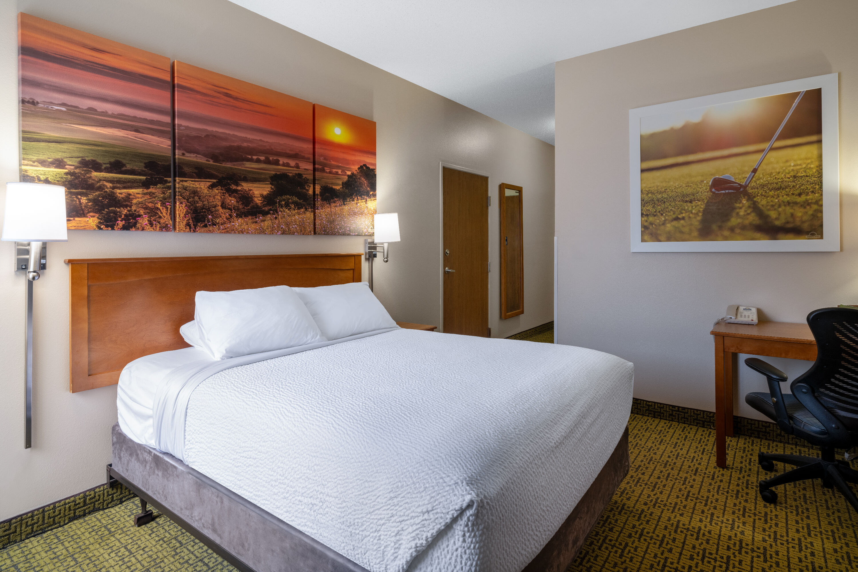 Guest room at the Days Inn & Suites by Wyndham Madison in Madison, Wisconsin