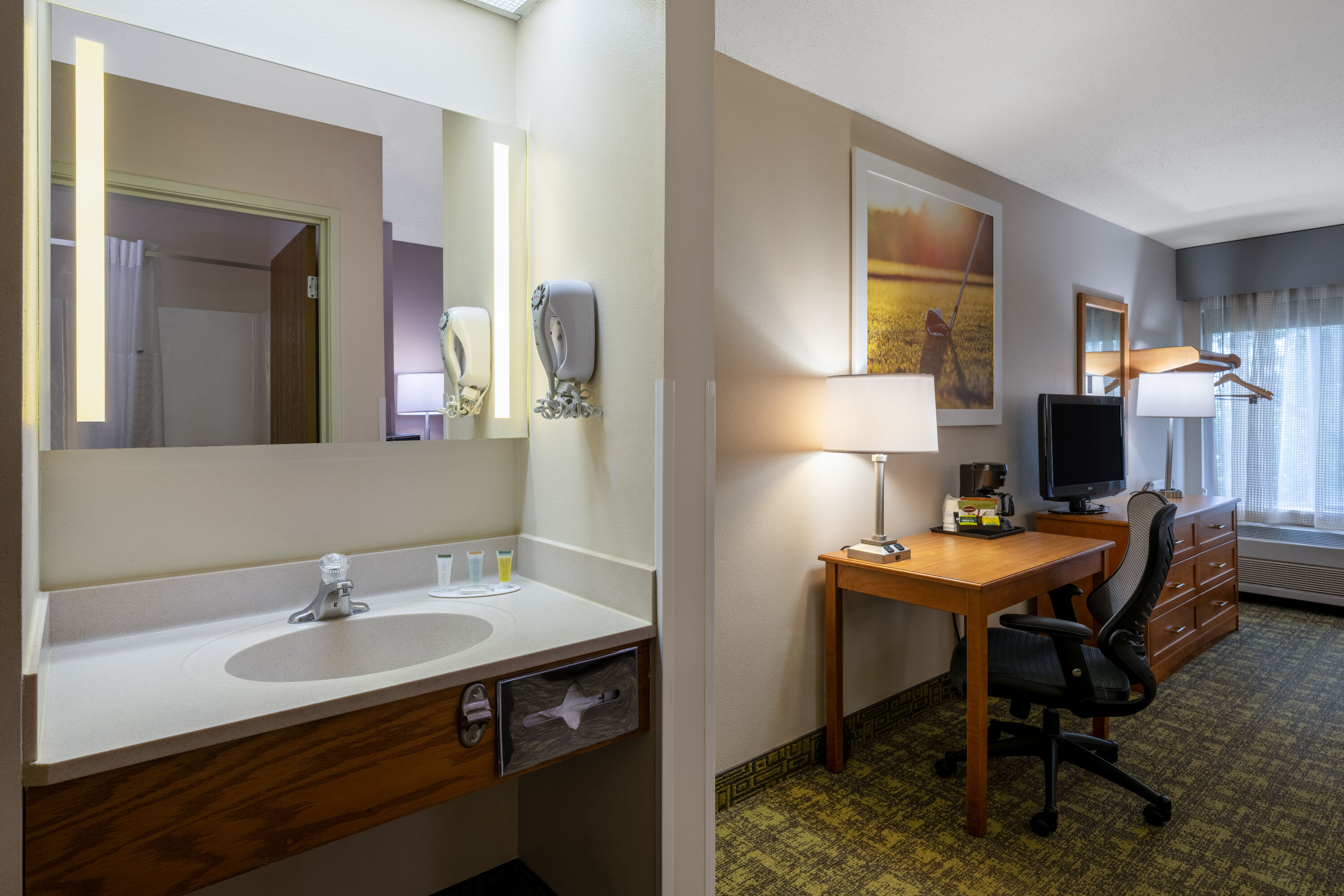Guest room at the Days Inn & Suites by Wyndham Madison in Madison, Wisconsin