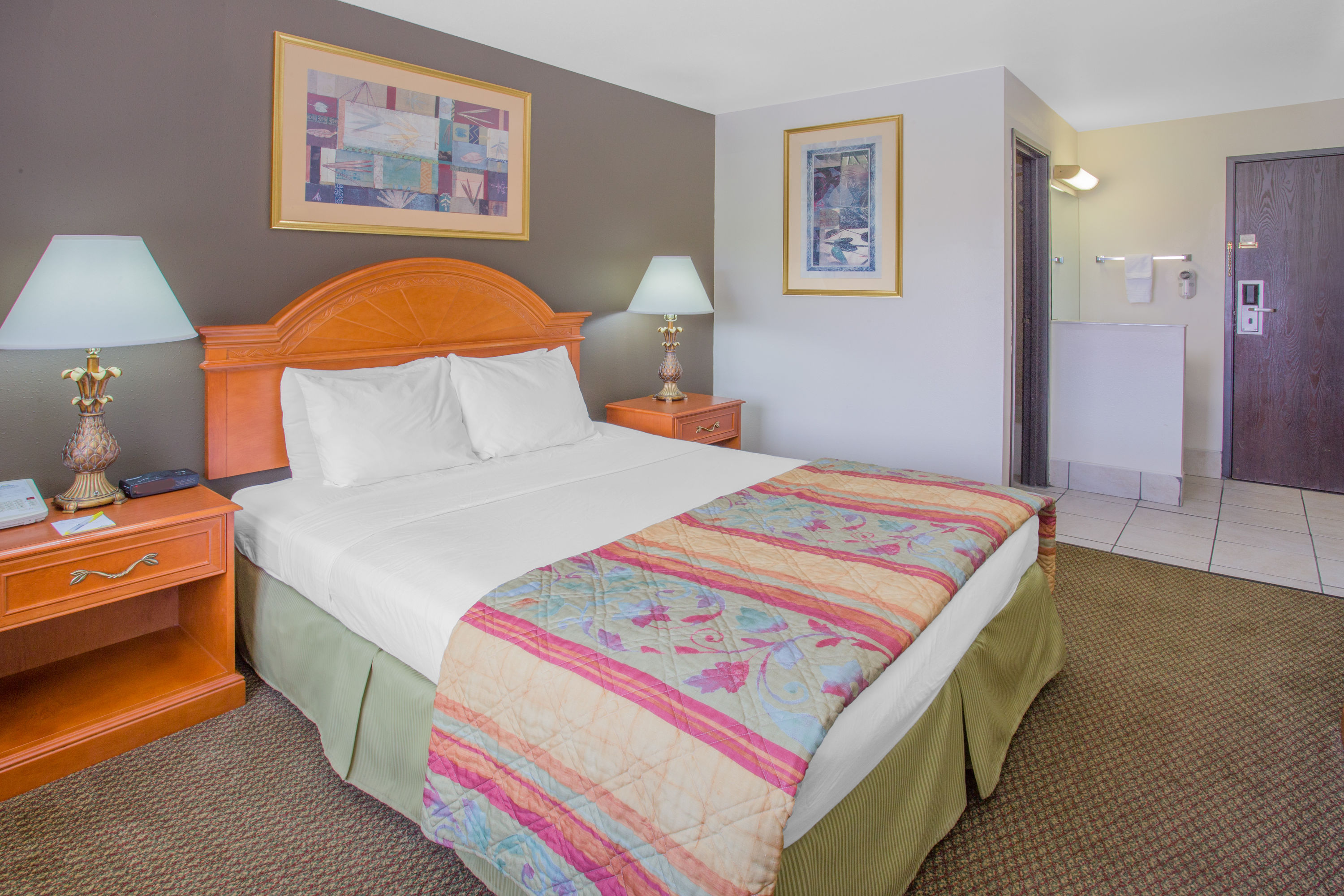 Guest room at the Days Inn by Wyndham Portage/Cascade Mountain Area in Portage, Wisconsin