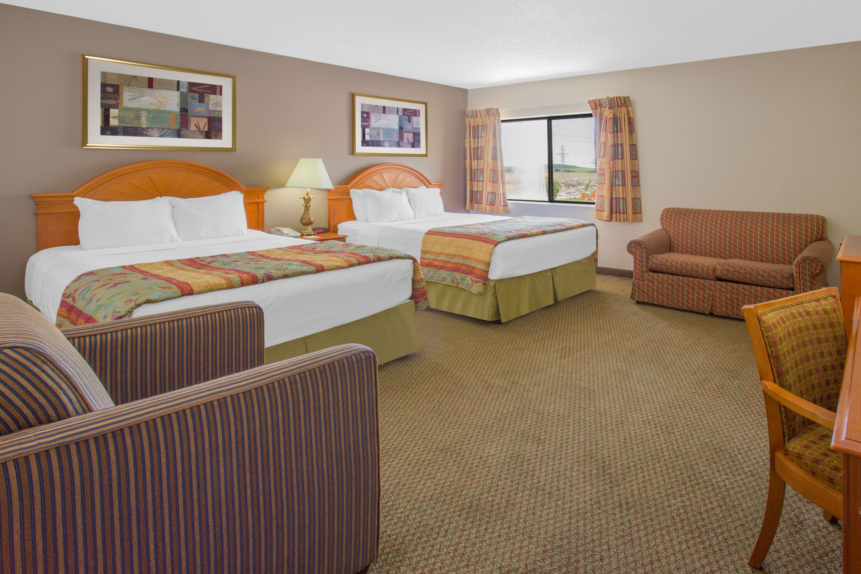 Guest room at the Days Inn by Wyndham Portage/Cascade Mountain Area in Portage, Wisconsin
