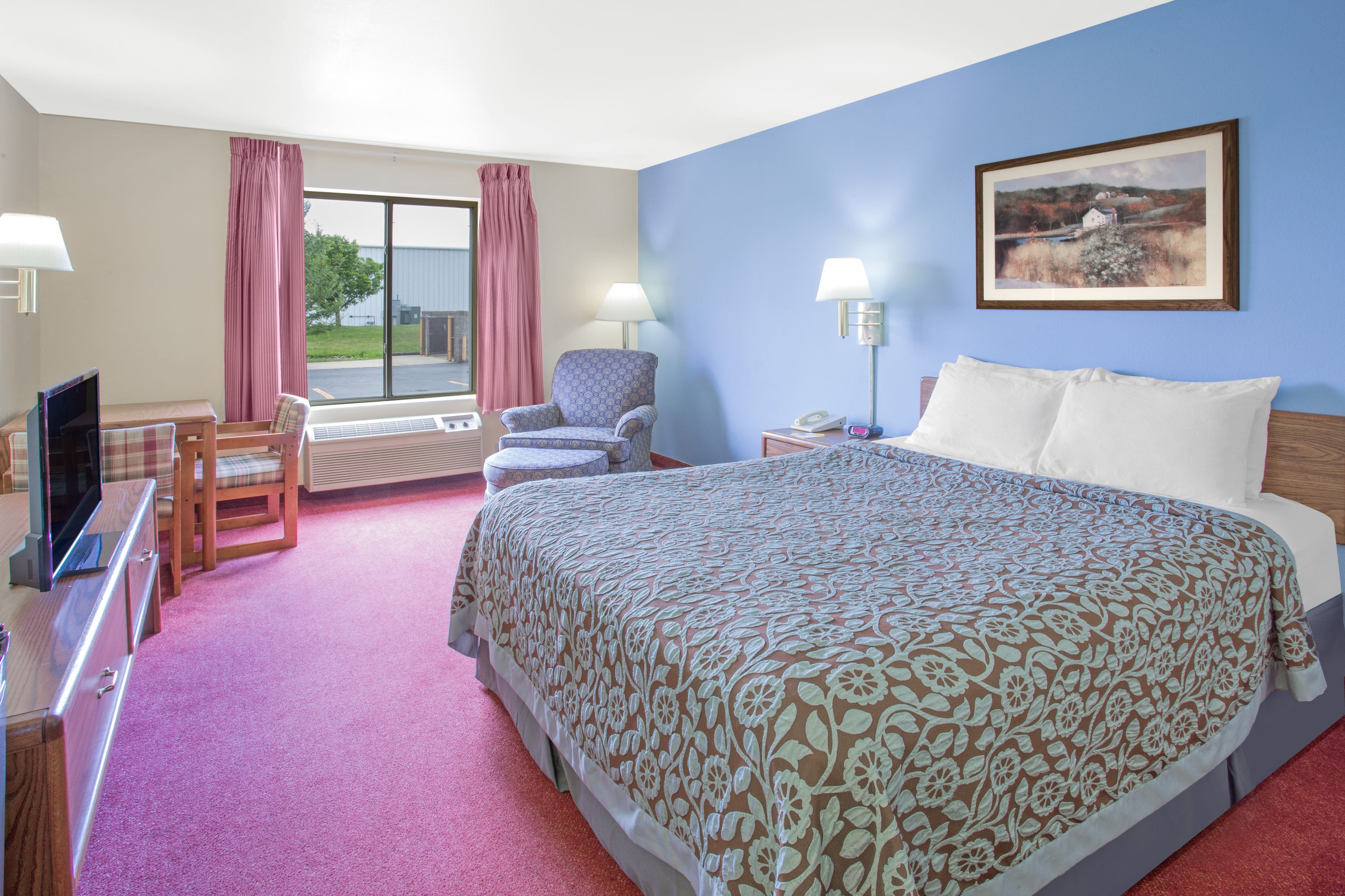 Guest room at the Days Inn by Wyndham Madison NE/Windsor in Windsor, Wisconsin