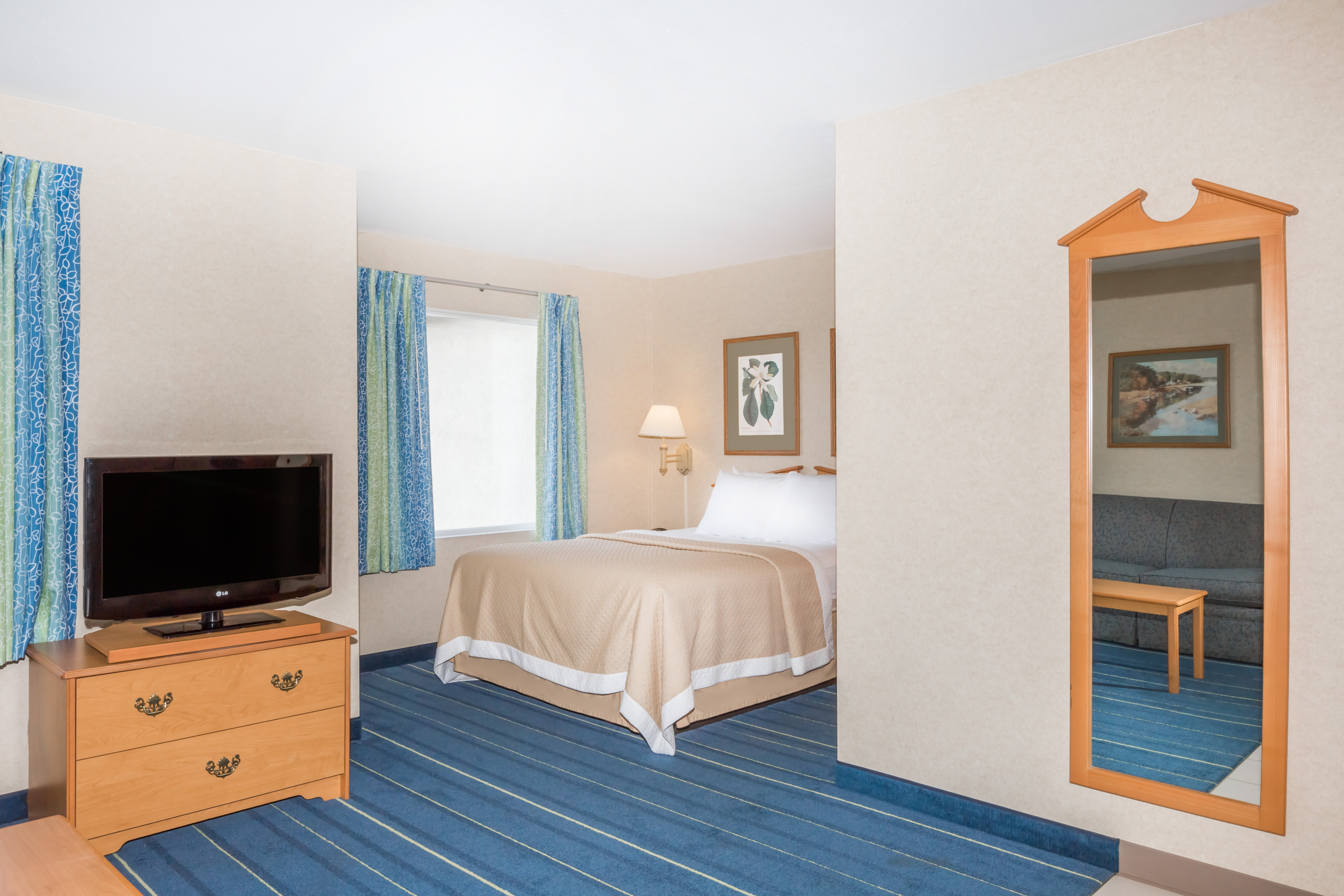 Guest room at the Days Inn & Suites by Wyndham Bridgeport - Clarksburg in Bridgeport, West Virginia