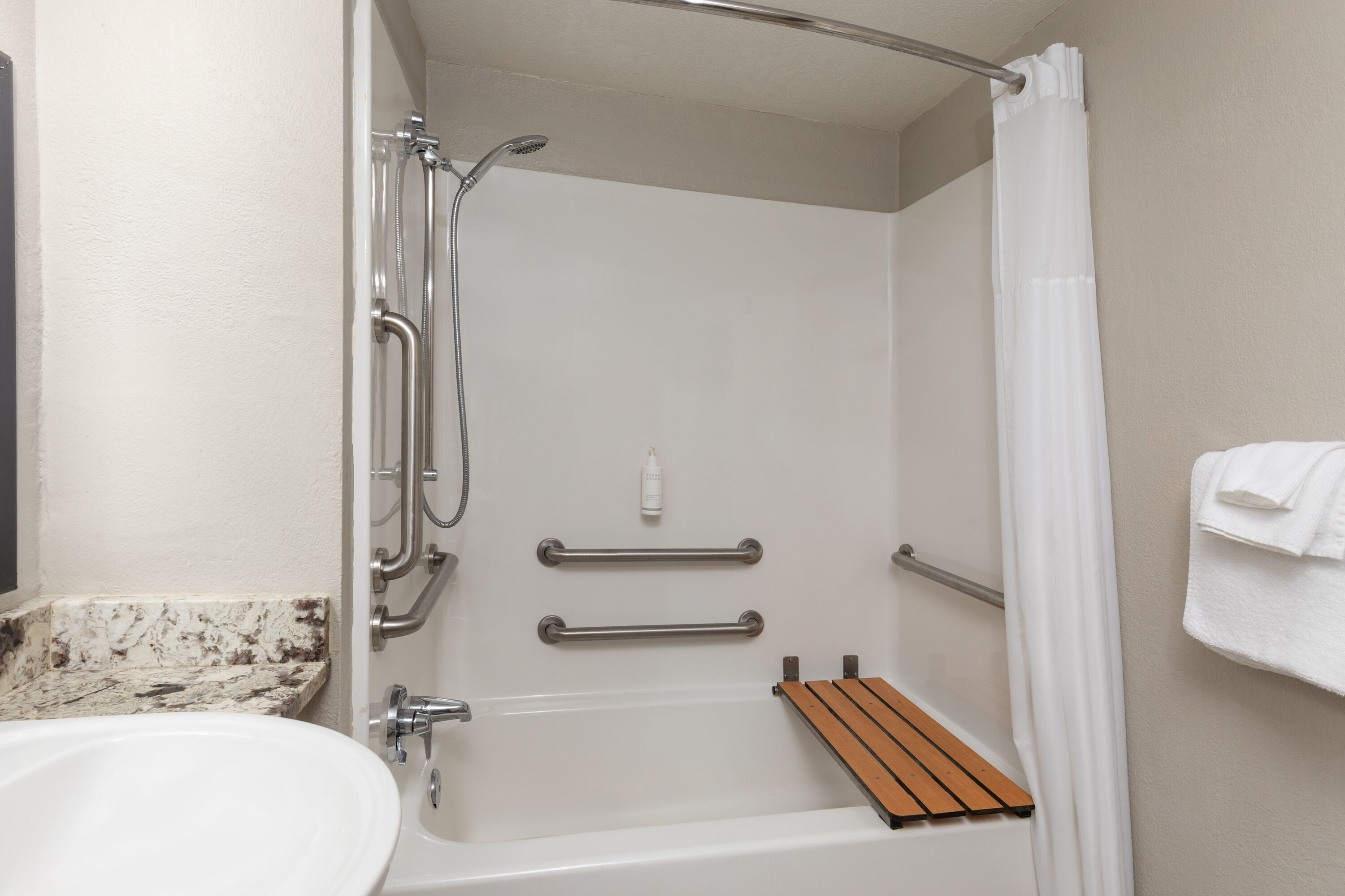 Guest room bath at the Days Inn by Wyndham Charleston WV in Charleston, West Virginia