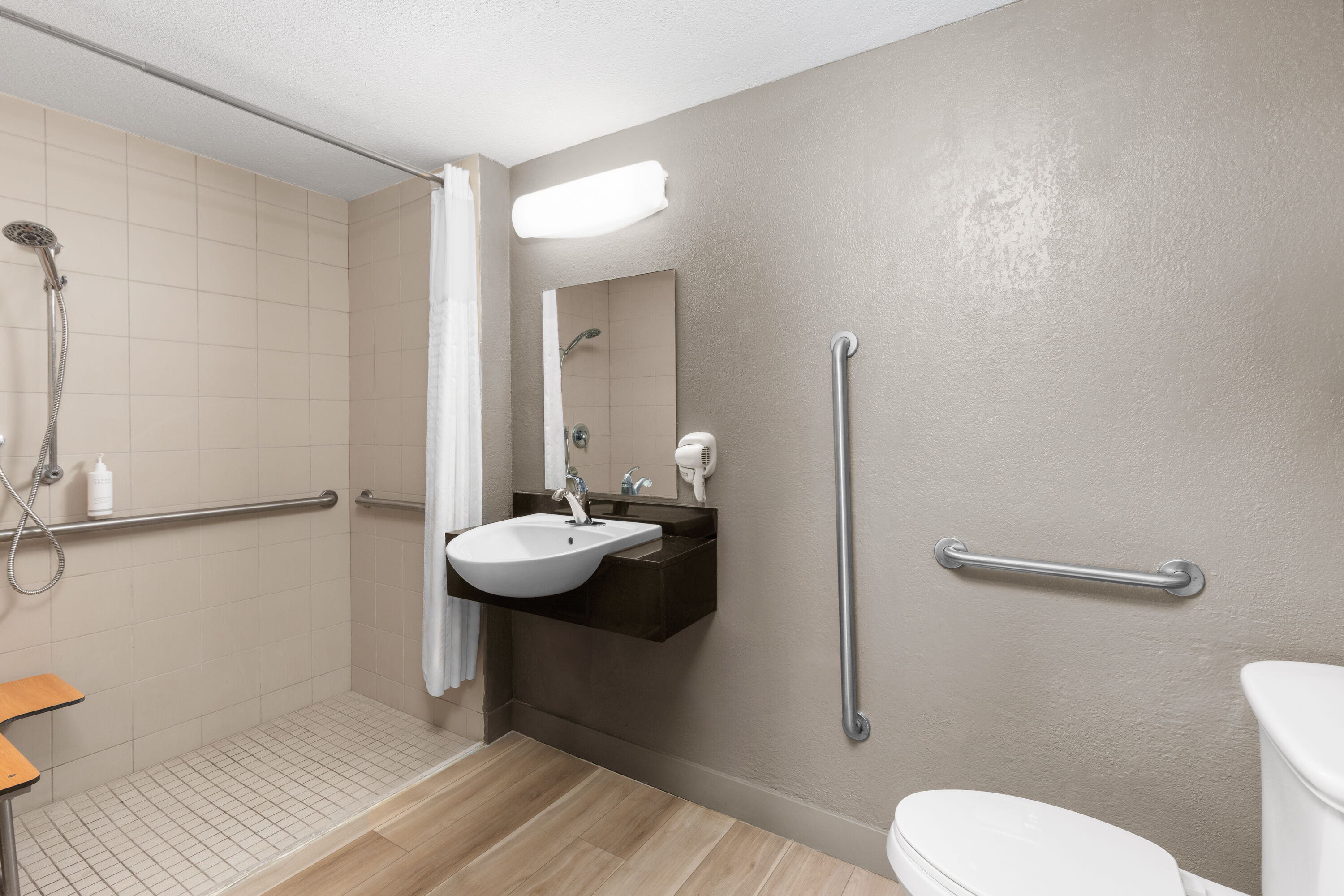 Guest room bath at the Days Inn by Wyndham Charleston WV in Charleston, West Virginia