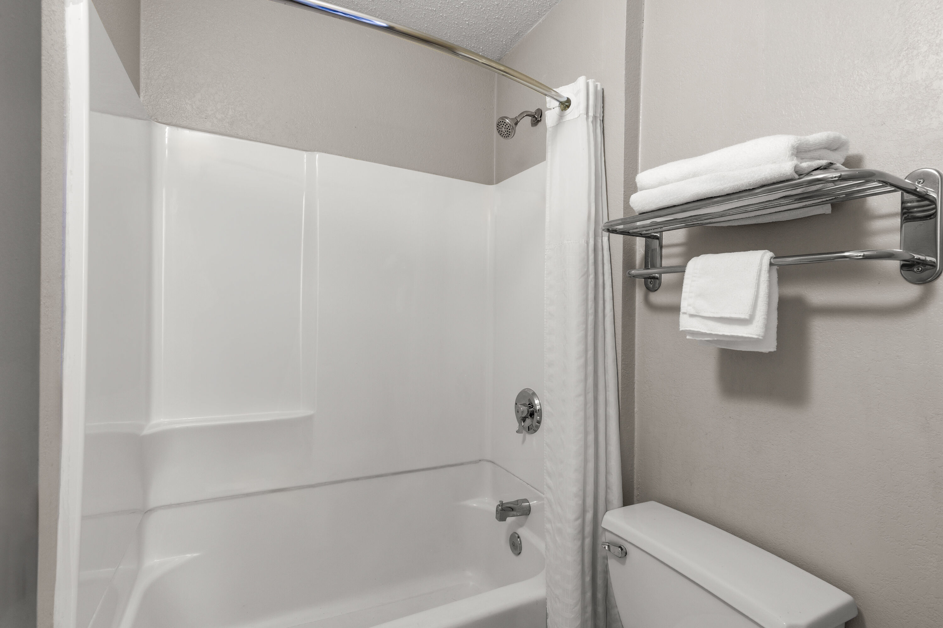 Guest room bath at the Days Inn by Wyndham Charleston WV in Charleston, West Virginia