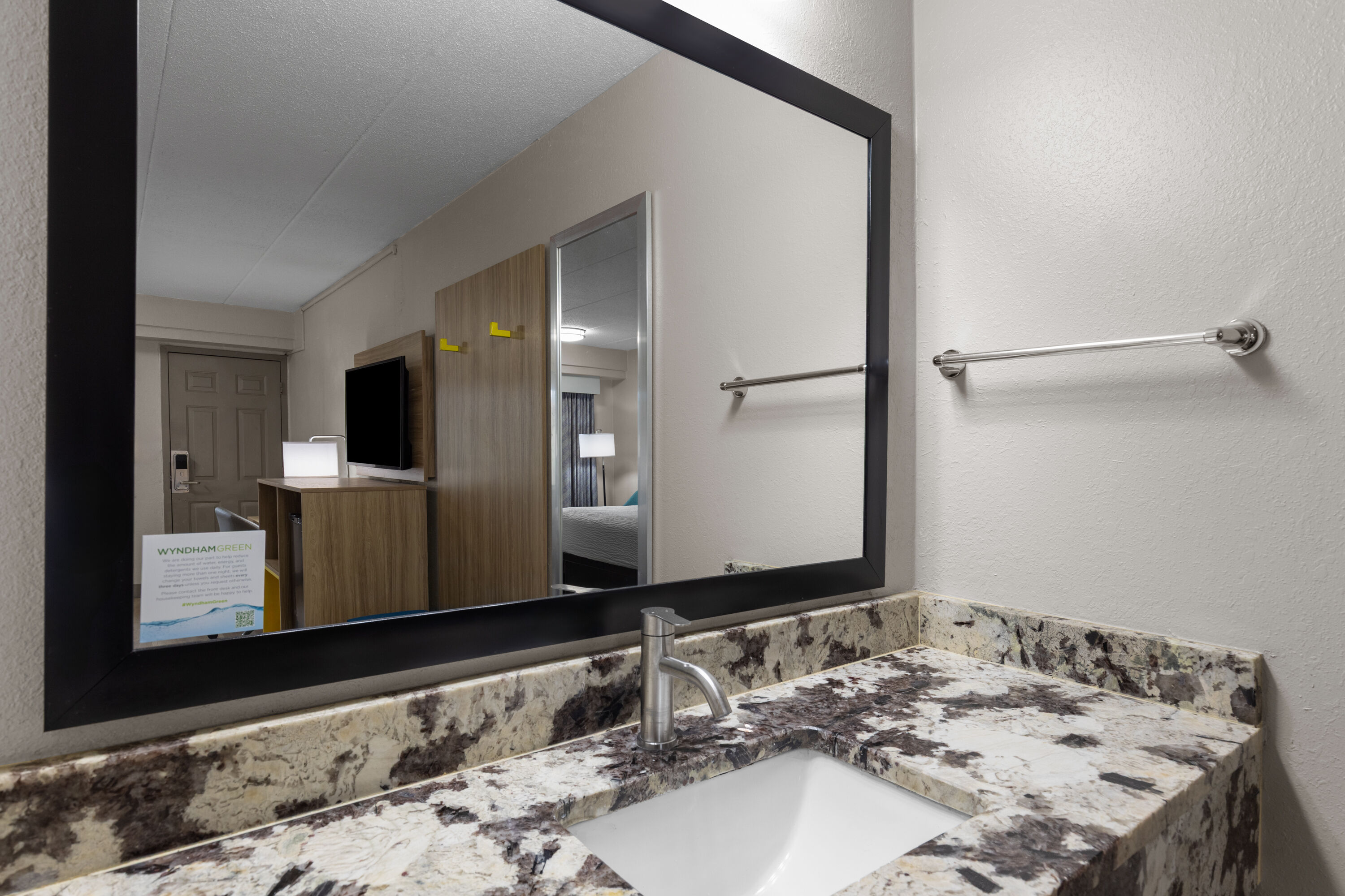 Guest room bath at the Days Inn by Wyndham Charleston WV in Charleston, West Virginia