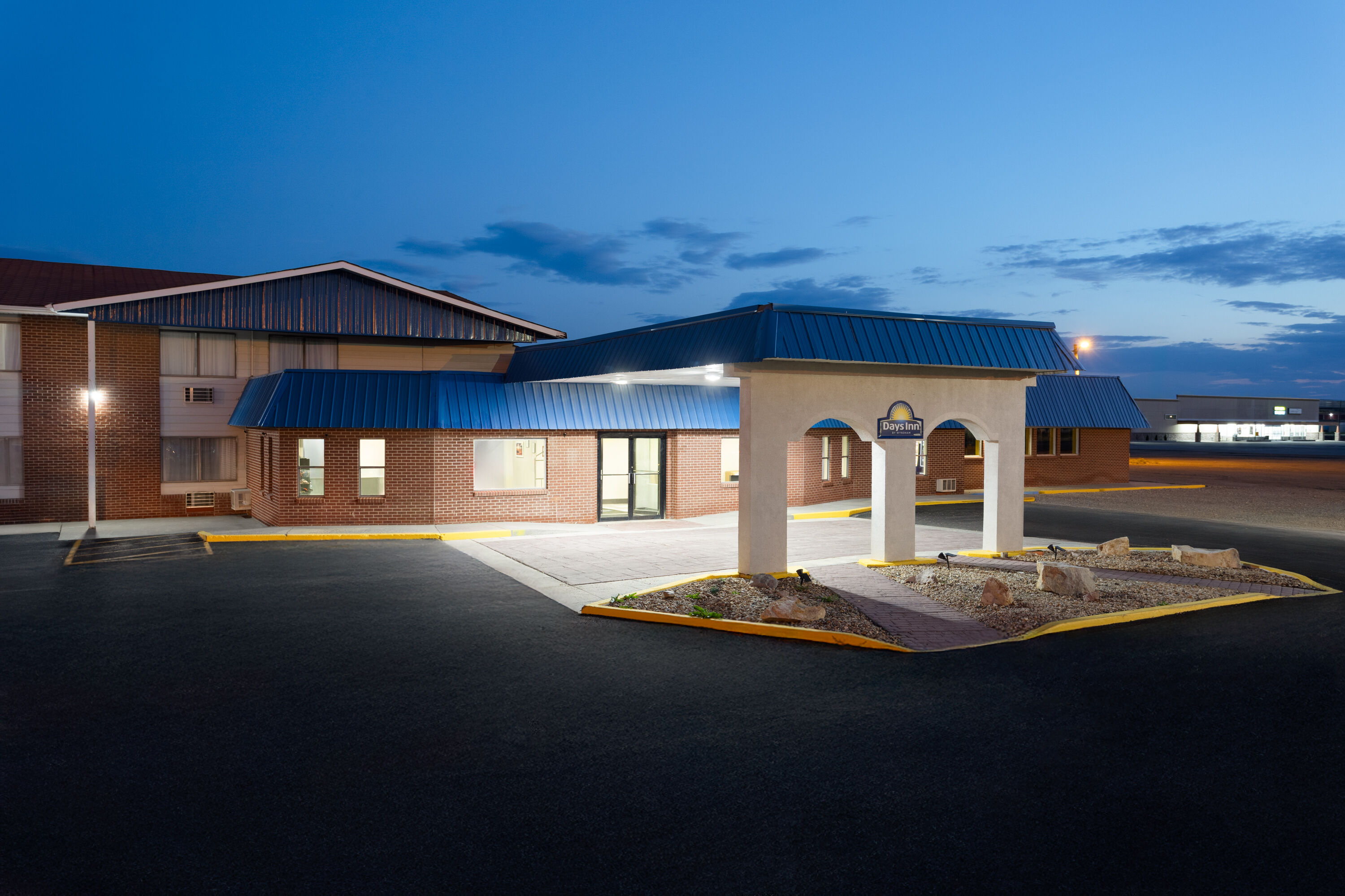 Exterior Dusk Image of Days Inn by Wyndham Rawlins hotel in Rawlins, Wyoming