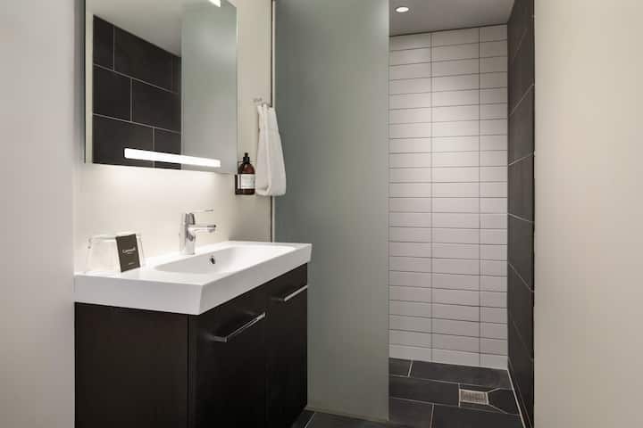 Guest room bath at the Comwell Hvide Hus Aalborg, Dolce by Wyndham in Aalborg, Other than US/Canada