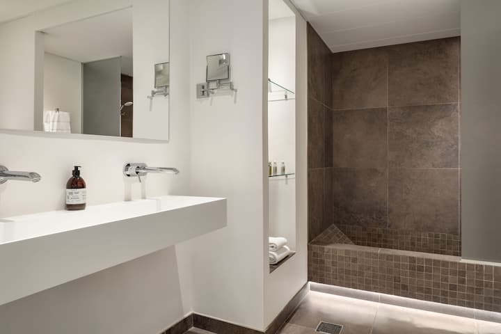 Guest room bath at the Comwell Hvide Hus Aalborg, Dolce by Wyndham in Aalborg, Other than US/Canada