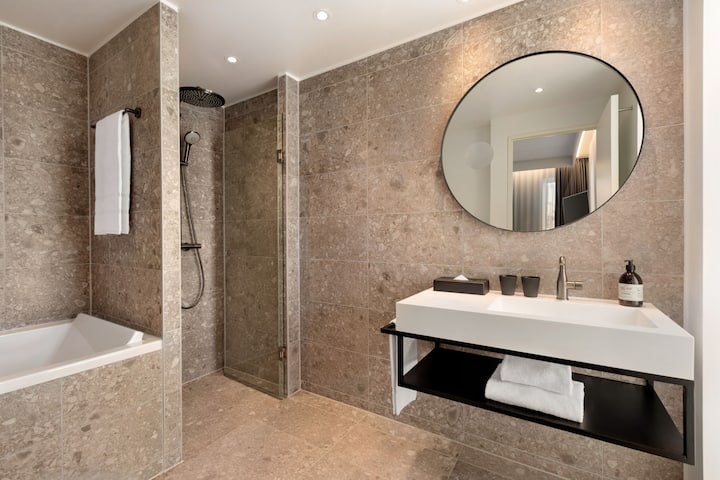 Guest room bath at the Comwell Copenhagen Portside Dolce by Wyndham in Copenhagen, Other than US/Canada