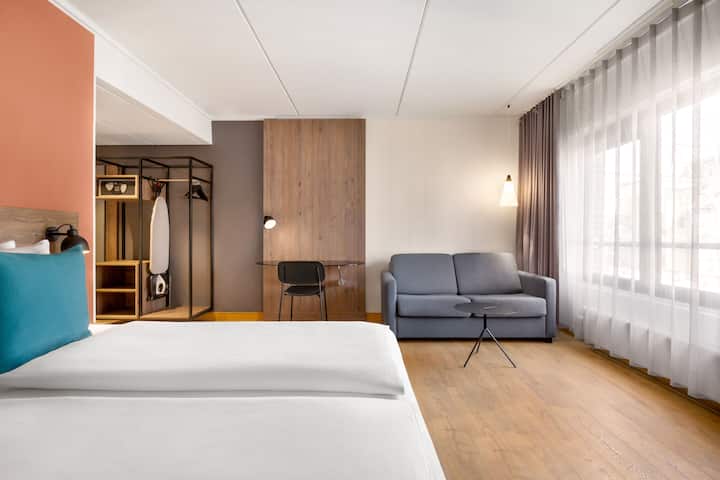Guest room at the Comwell H. C. Andersen Odense Dolce by Wyndham in Odense C, Other than US/Canada