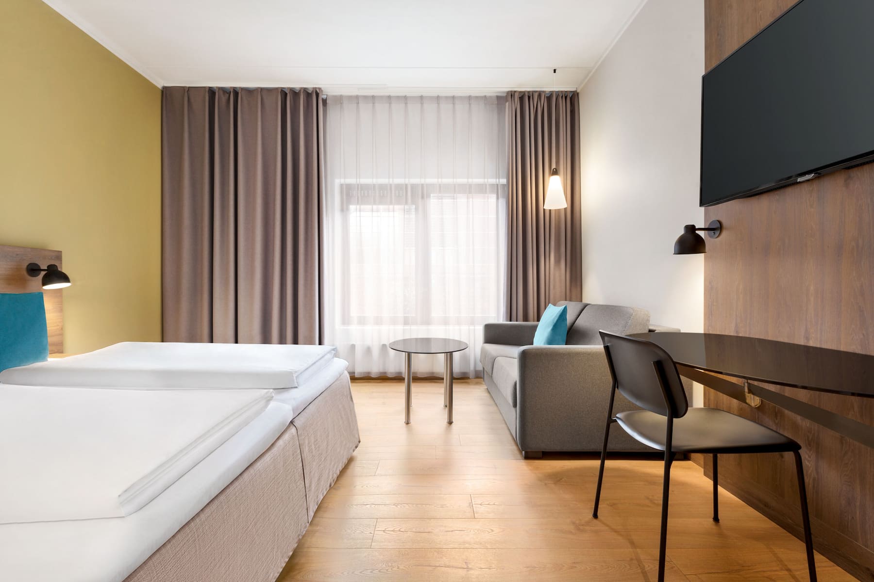 Guest room at the Comwell H. C. Andersen Odense Dolce by Wyndham in Odense C, Other than US/Canada