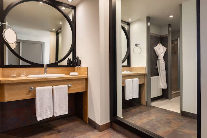 Guest room bath at the Dolce by Wyndham Barcelona Resort in Sant Esteve Sesrovires, Other than US/Canada