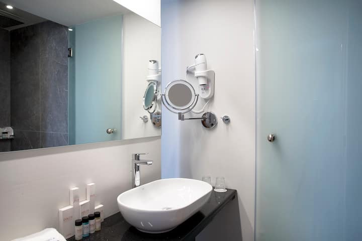 Guest room bath at the Dolce by Wyndham Athens Attica Riviera in Vravrona, Other than US/Canada