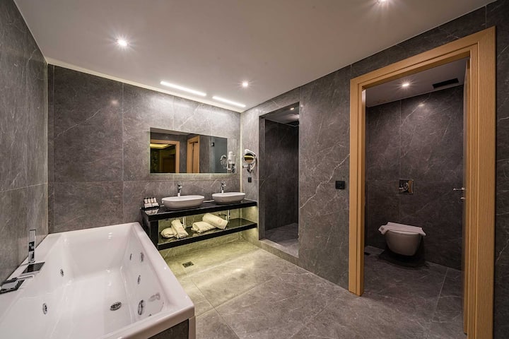 Guest room bath at the Dolce by Wyndham Athens Attica Riviera in Vravrona, Other than US/Canada
