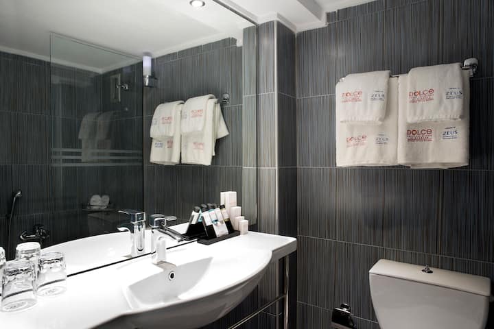 Guest room bath at the Dolce by Wyndham Athens Attica Riviera in Vravrona, Other than US/Canada
