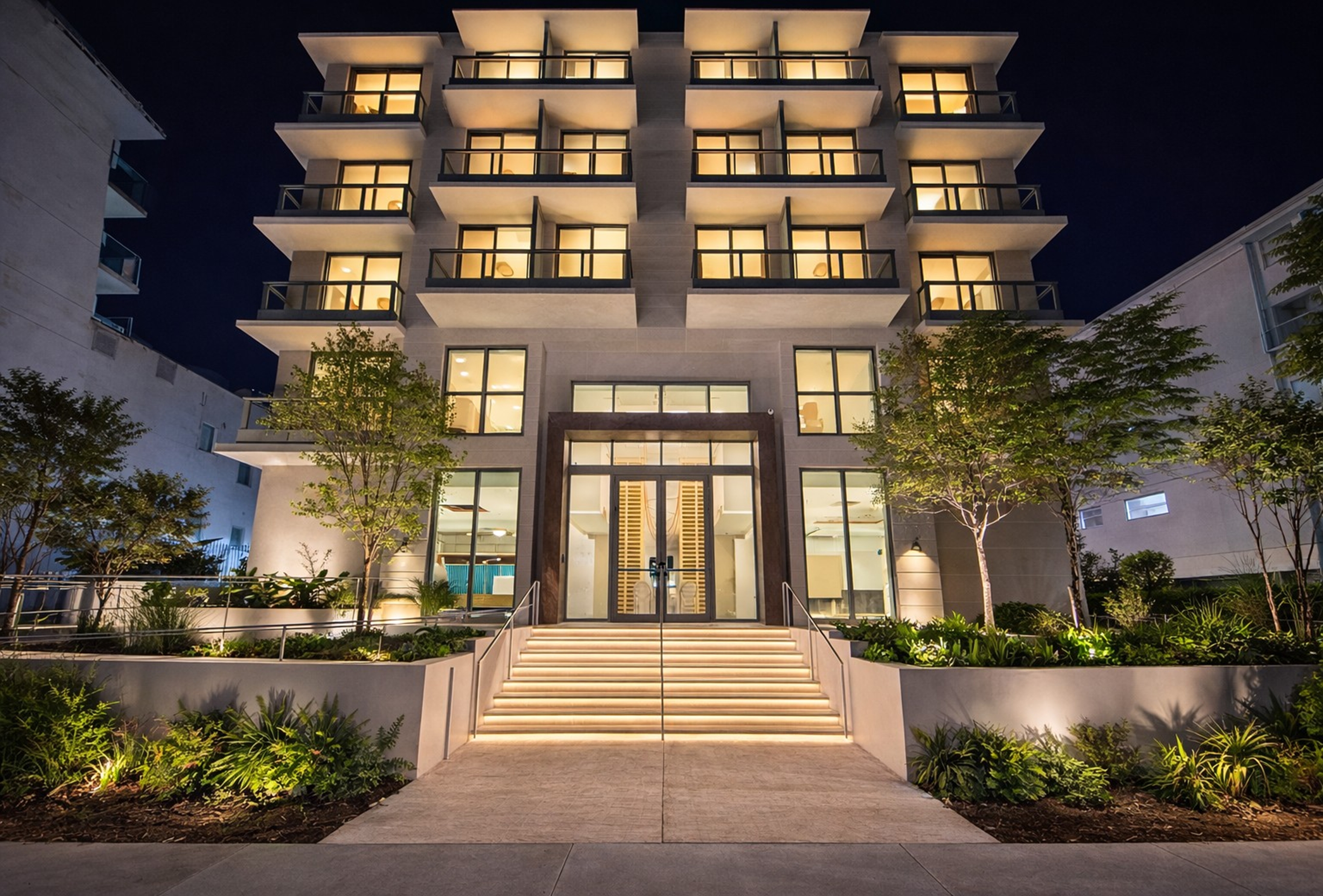 Exterior Night Image of Dolce by Wyndham Miami Beach hotel in Miami Beach, Florida