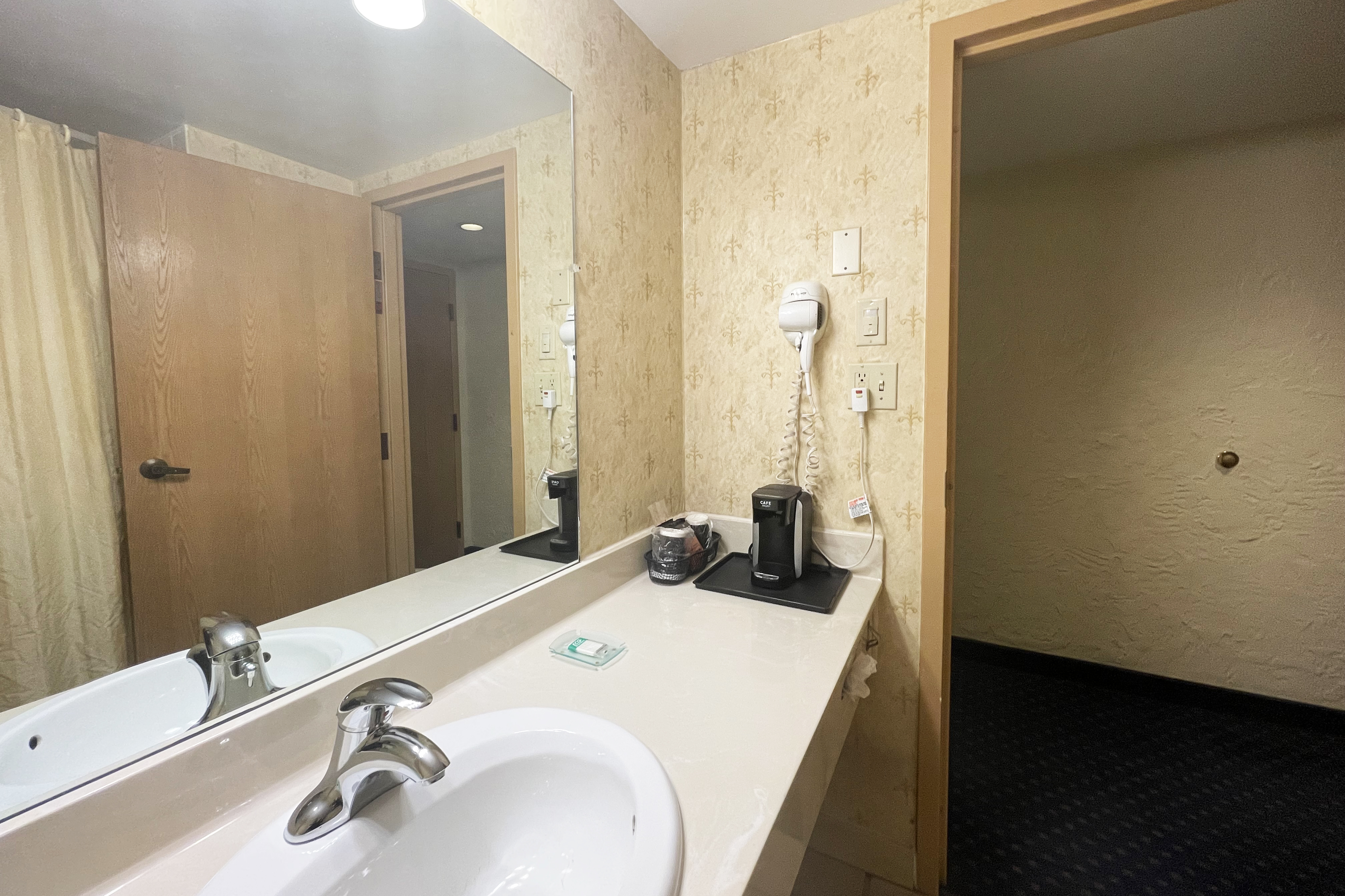 Guest room bath at the Chateau Hotel and Conference Center in Bloomington, Illinois
