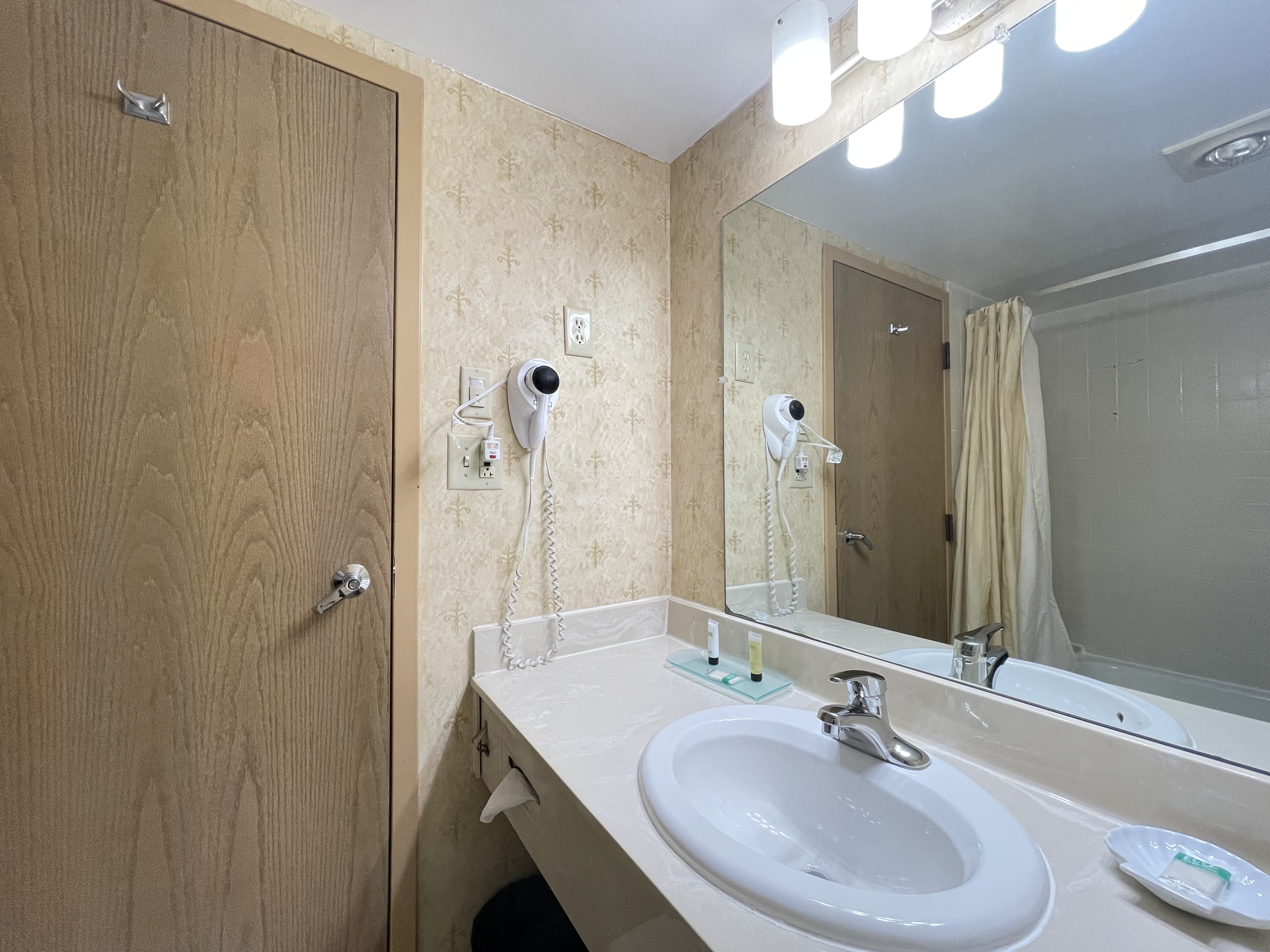 Guest room bath at the Chateau Hotel and Conference Center in Bloomington, Illinois