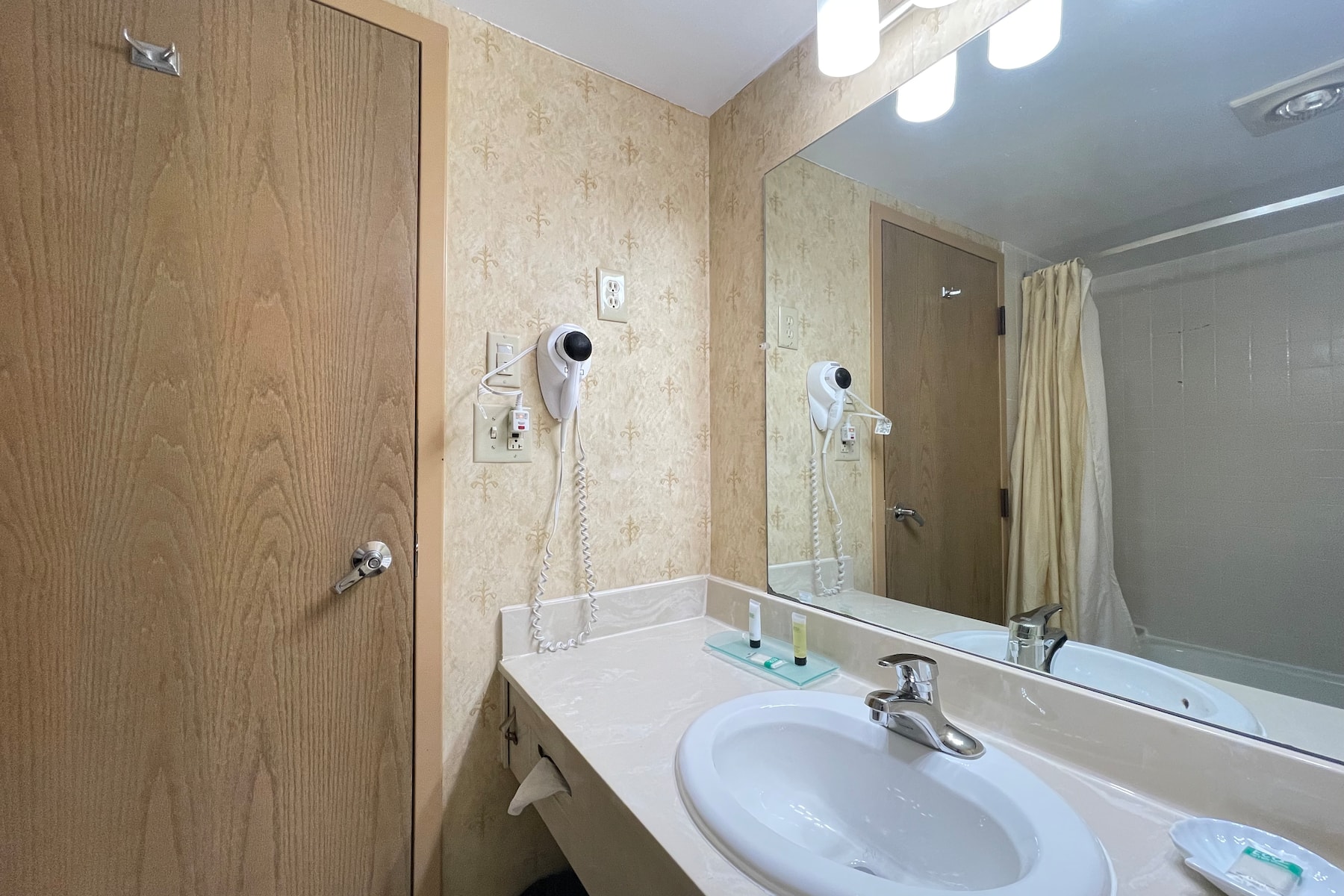 Guest room bath at the Chateau Hotel and Conference Center in Bloomington, Illinois