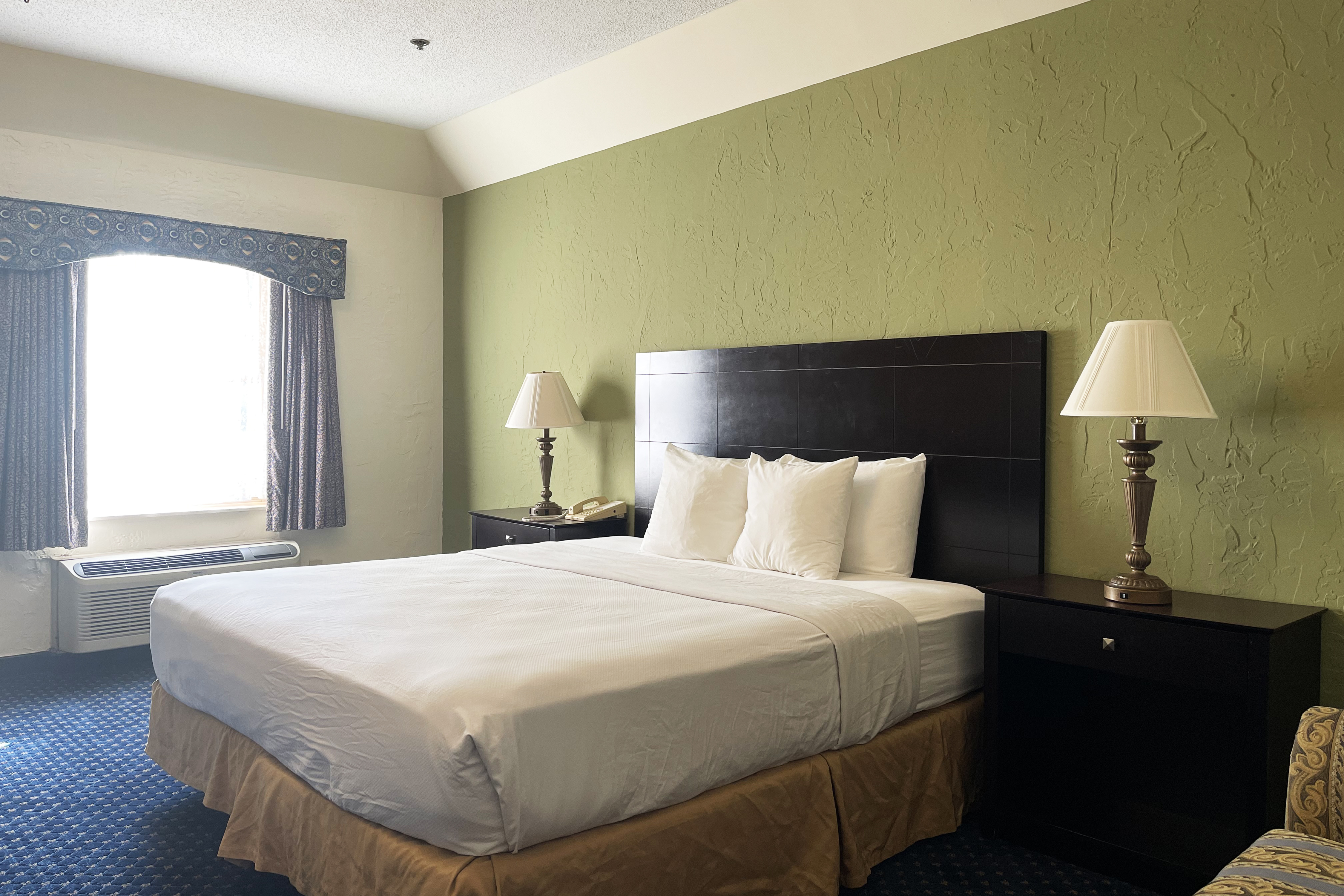Guest room at the Chateau Hotel and Conference Center in Bloomington, Illinois
