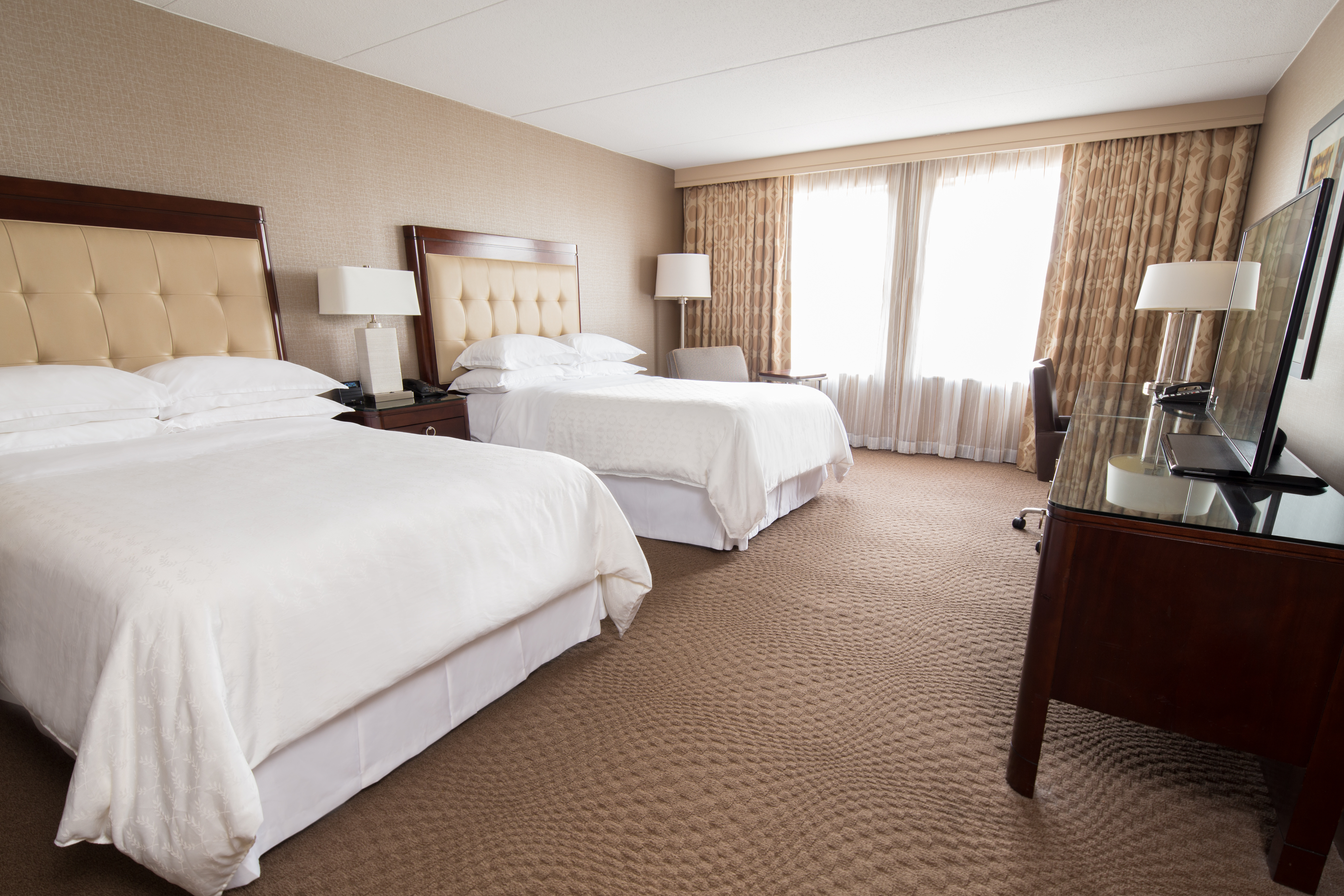 Guest room at the Dolce by Wyndham Parsippany in Parsippany, New Jersey