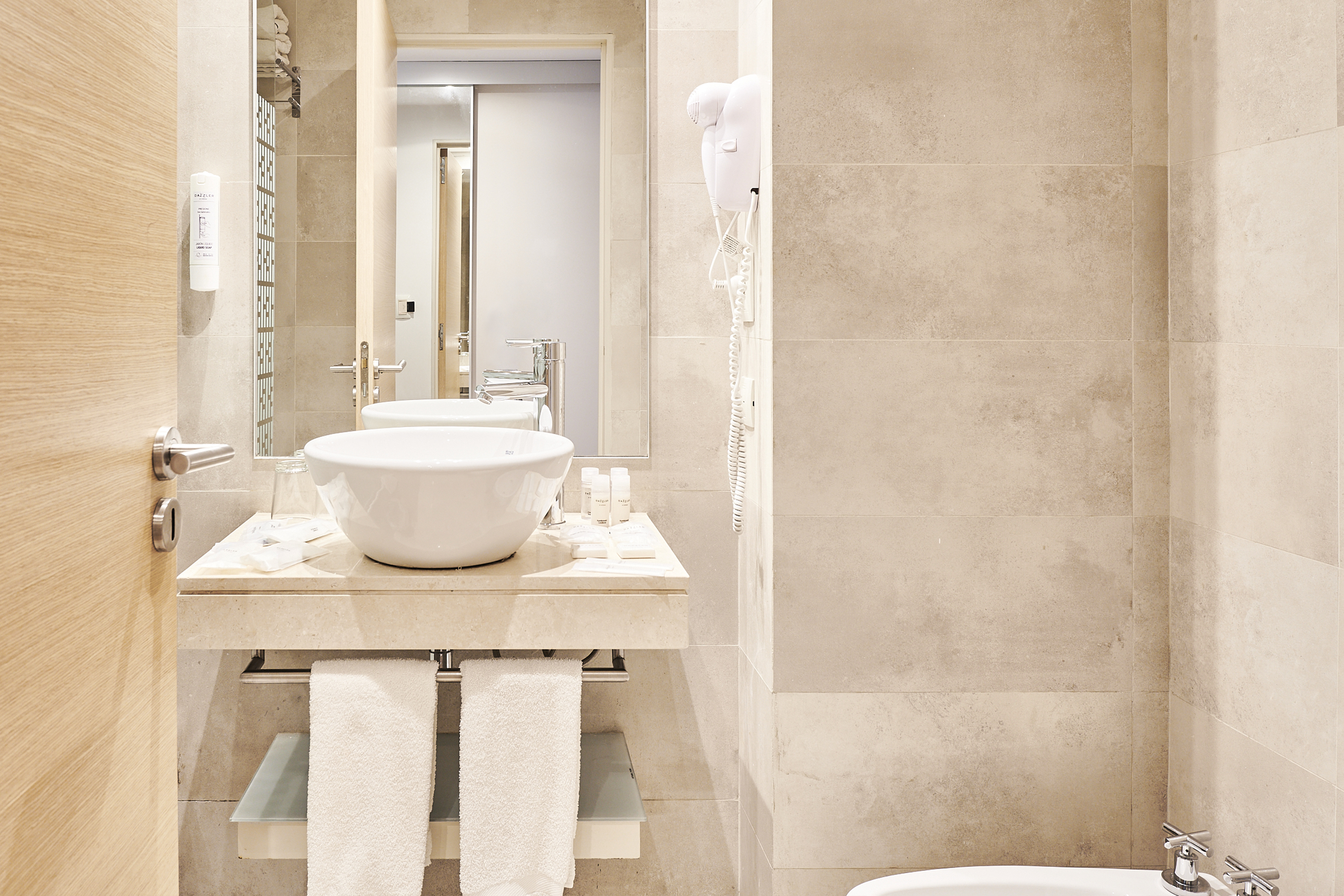 Guest room bath at the Dazzler by Wyndham Rosario in Rosario, Other than US/Canada