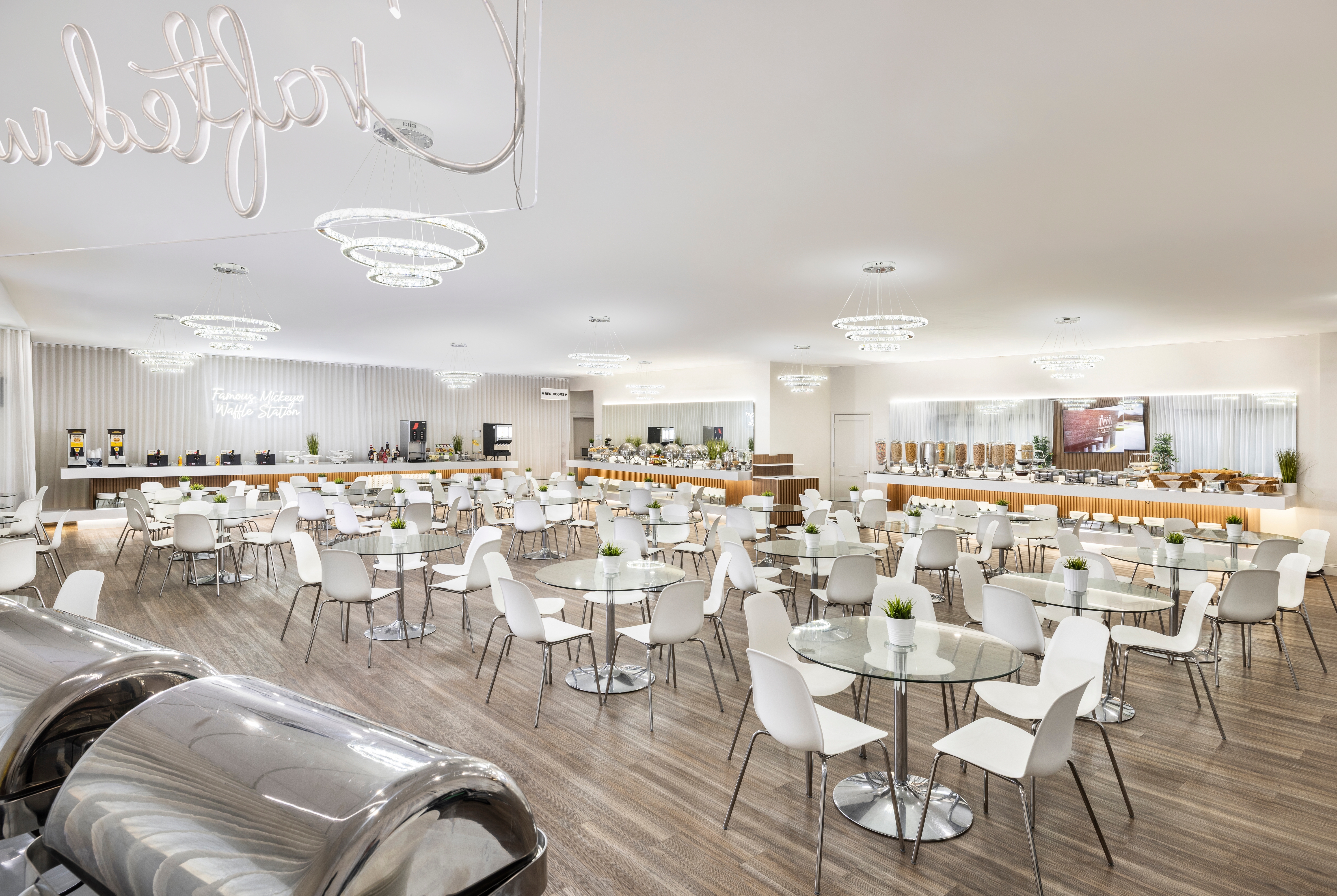 Magic Moment Resort & Kids Club, Dazzler Select by Wyndham restaurant breakfast area with seating in Kissimmee, Florida
