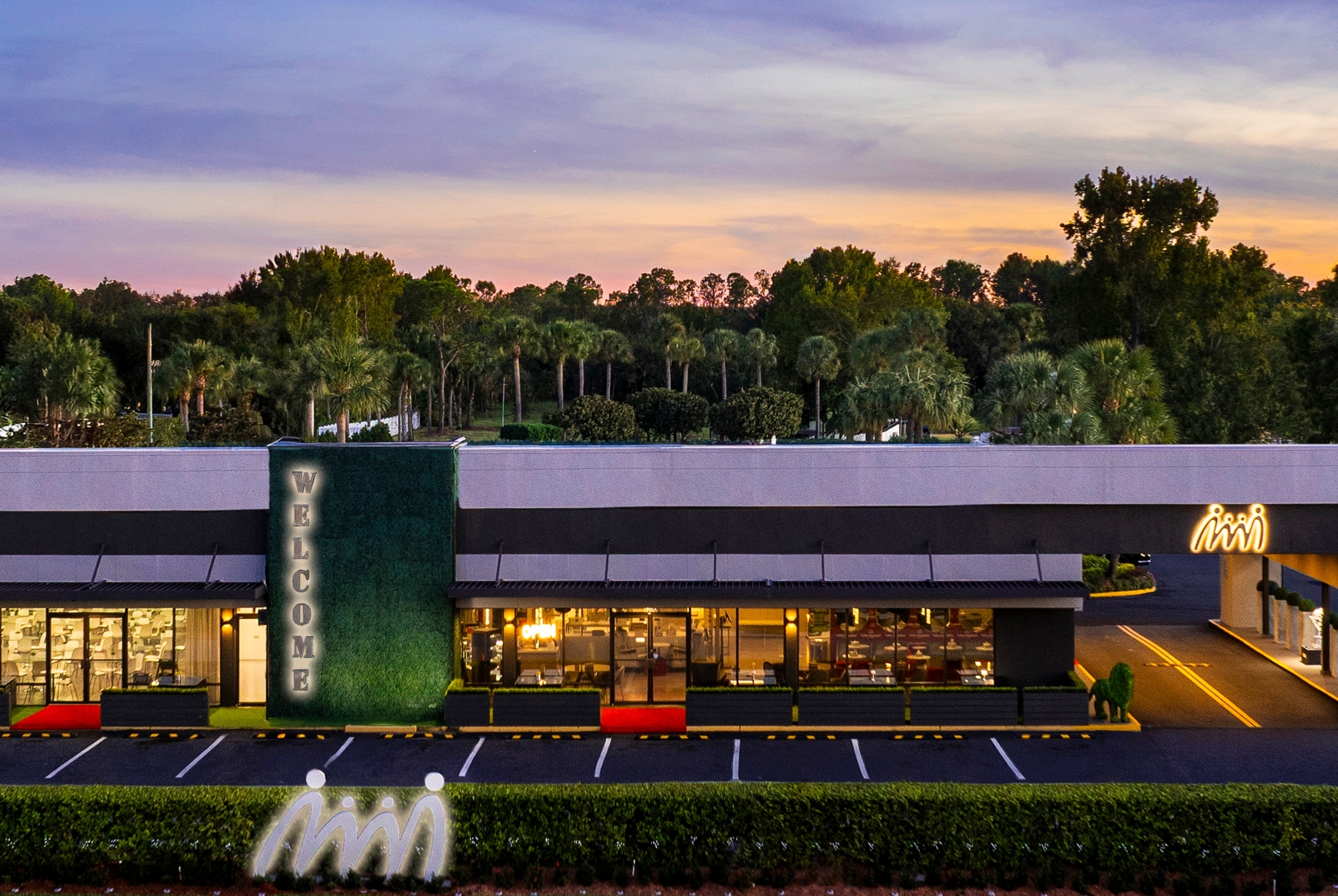 Exterior Dusk Image of Magic Moment Resort & Kids Club, Dazzler Select by Wyndham hotel in Kissimmee, Florida