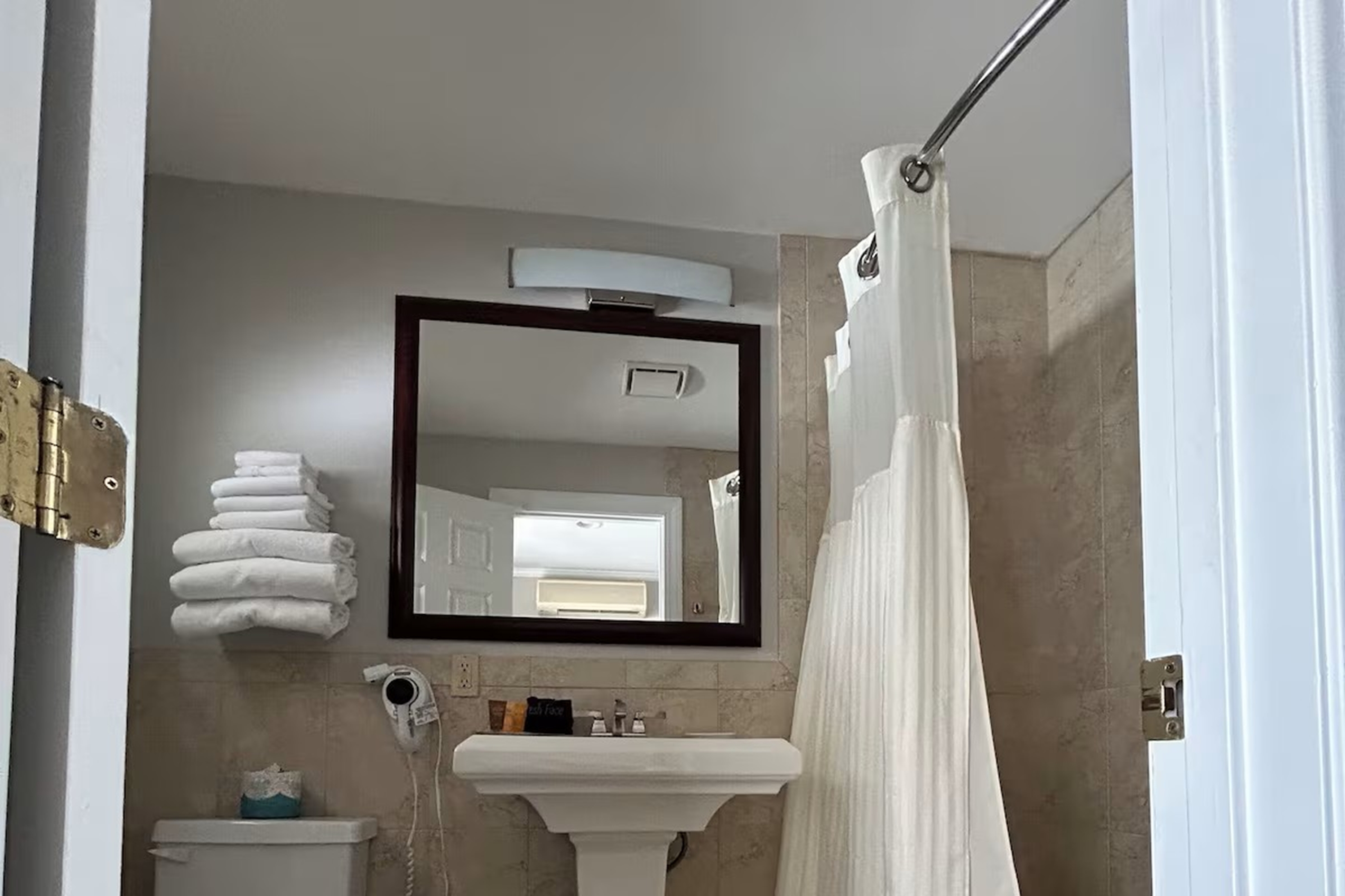 Guest room bath at the Golden Gables Inn, Dazzler Select by Wyndham in North Conway, New Hampshire