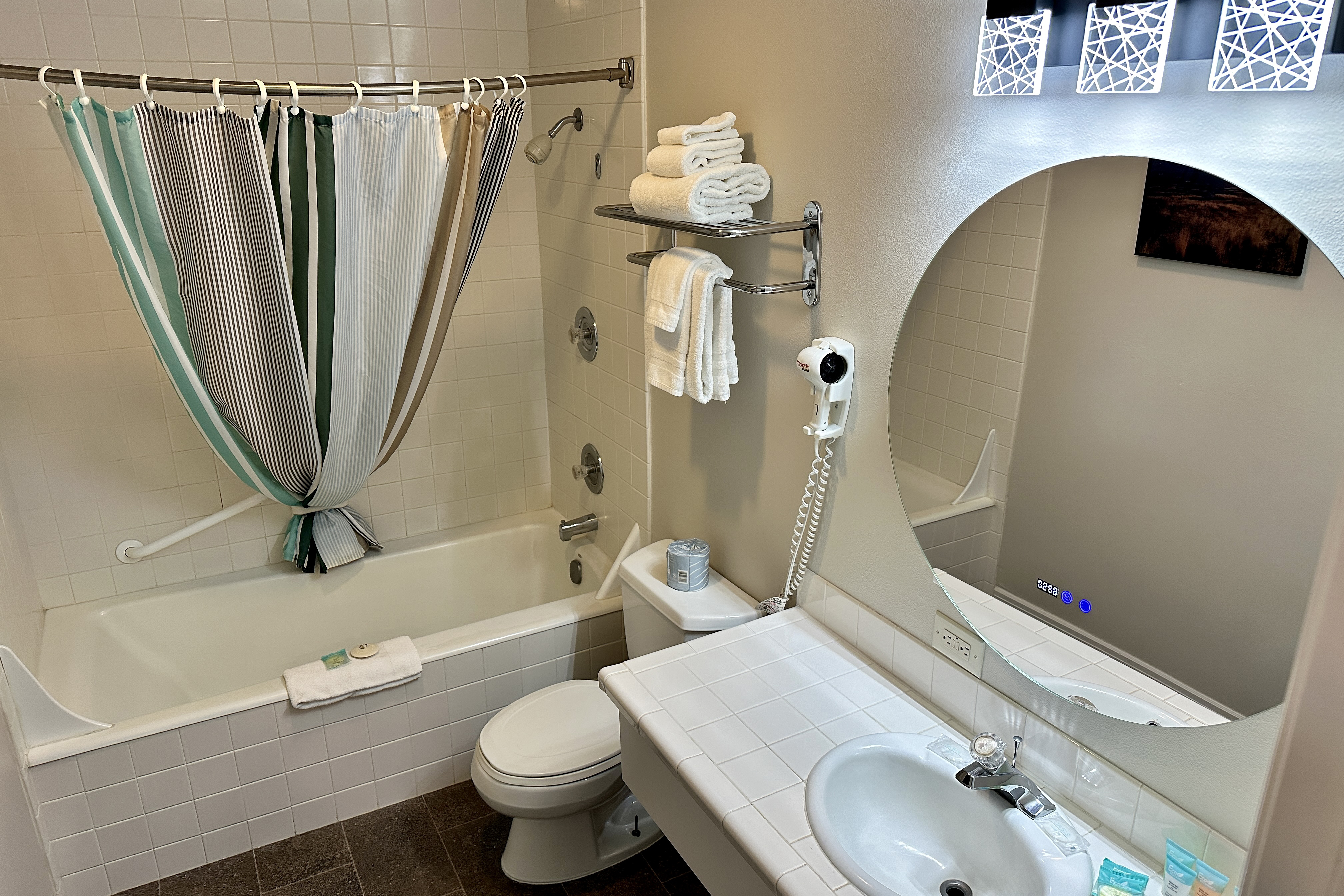 Guest room bath at the Soap Lake Resort, a Dazzler Select by Wyndham in Soap Lake, Washington