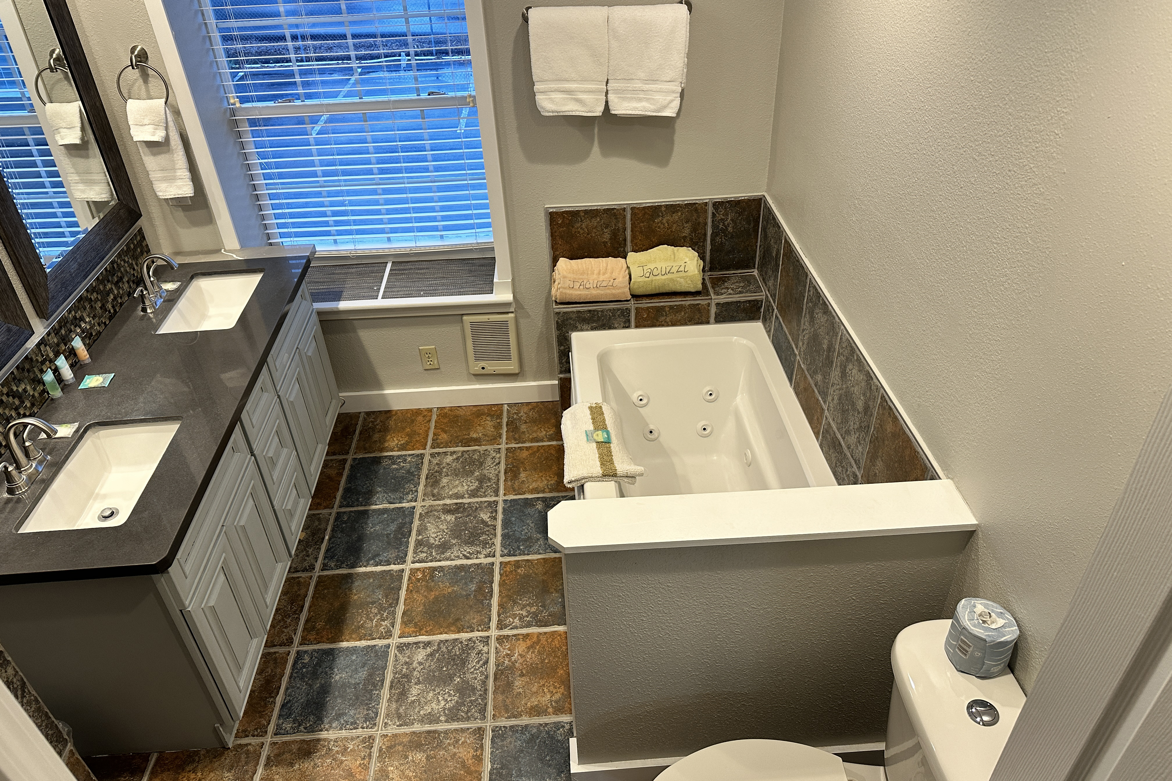 Guest room bath at the Soap Lake Resort, a Dazzler Select by Wyndham in Soap Lake, Washington