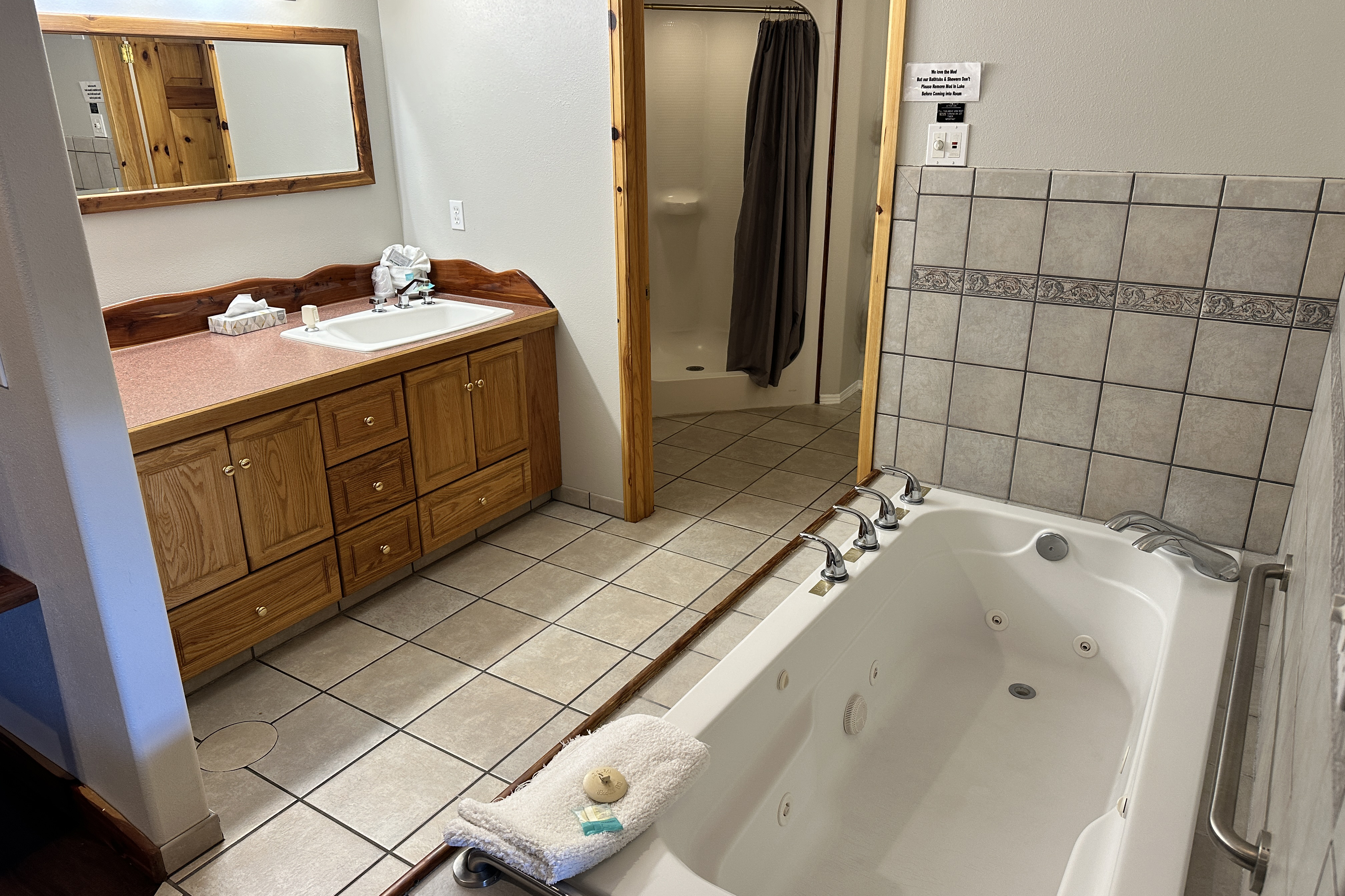 Guest room bath at the Soap Lake Resort, a Dazzler Select by Wyndham in Soap Lake, Washington