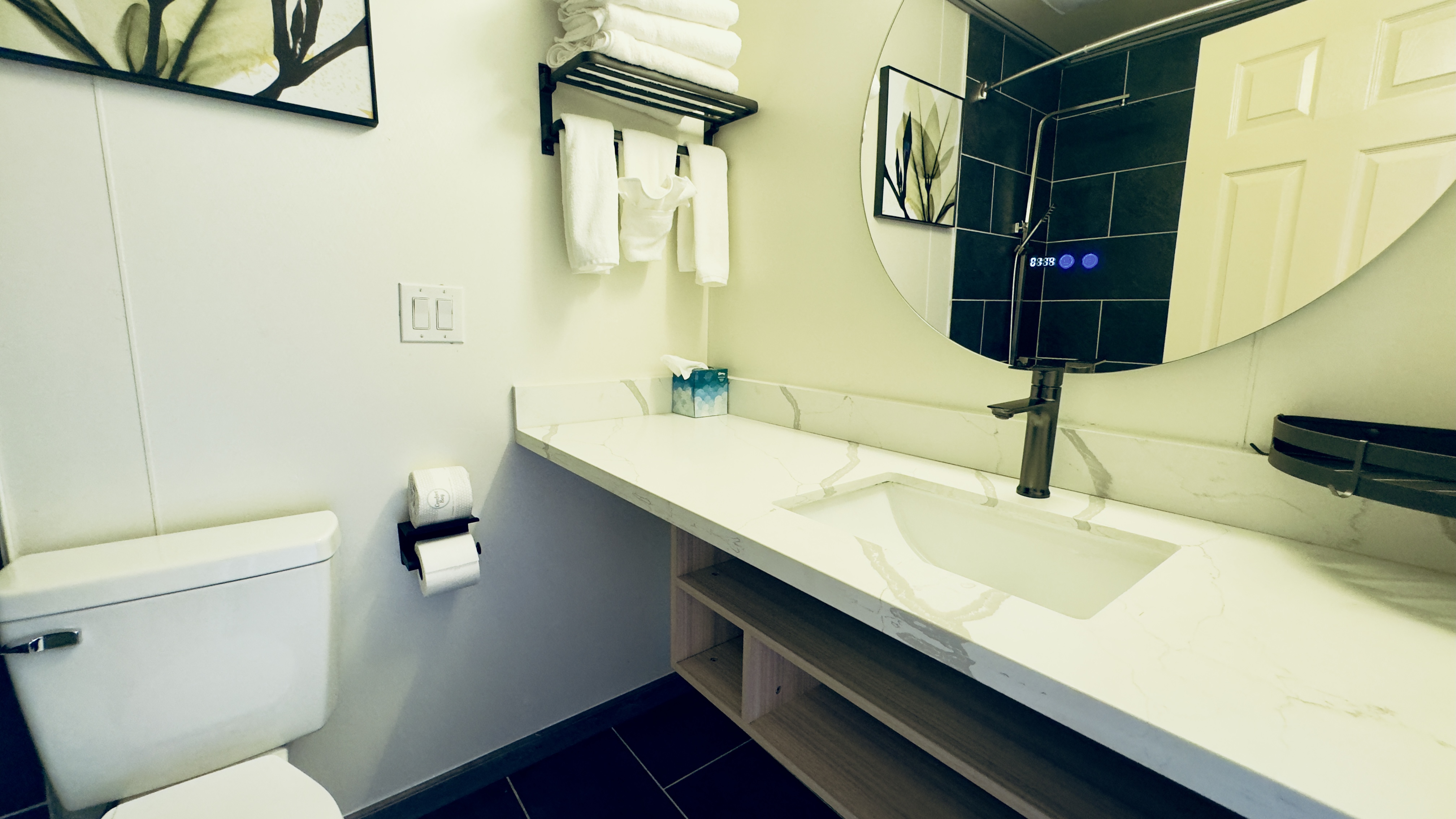 Guest room bath at the Interurban Suites Hotel, a Dazzler Select by Wyndham in Tukwila, Washington