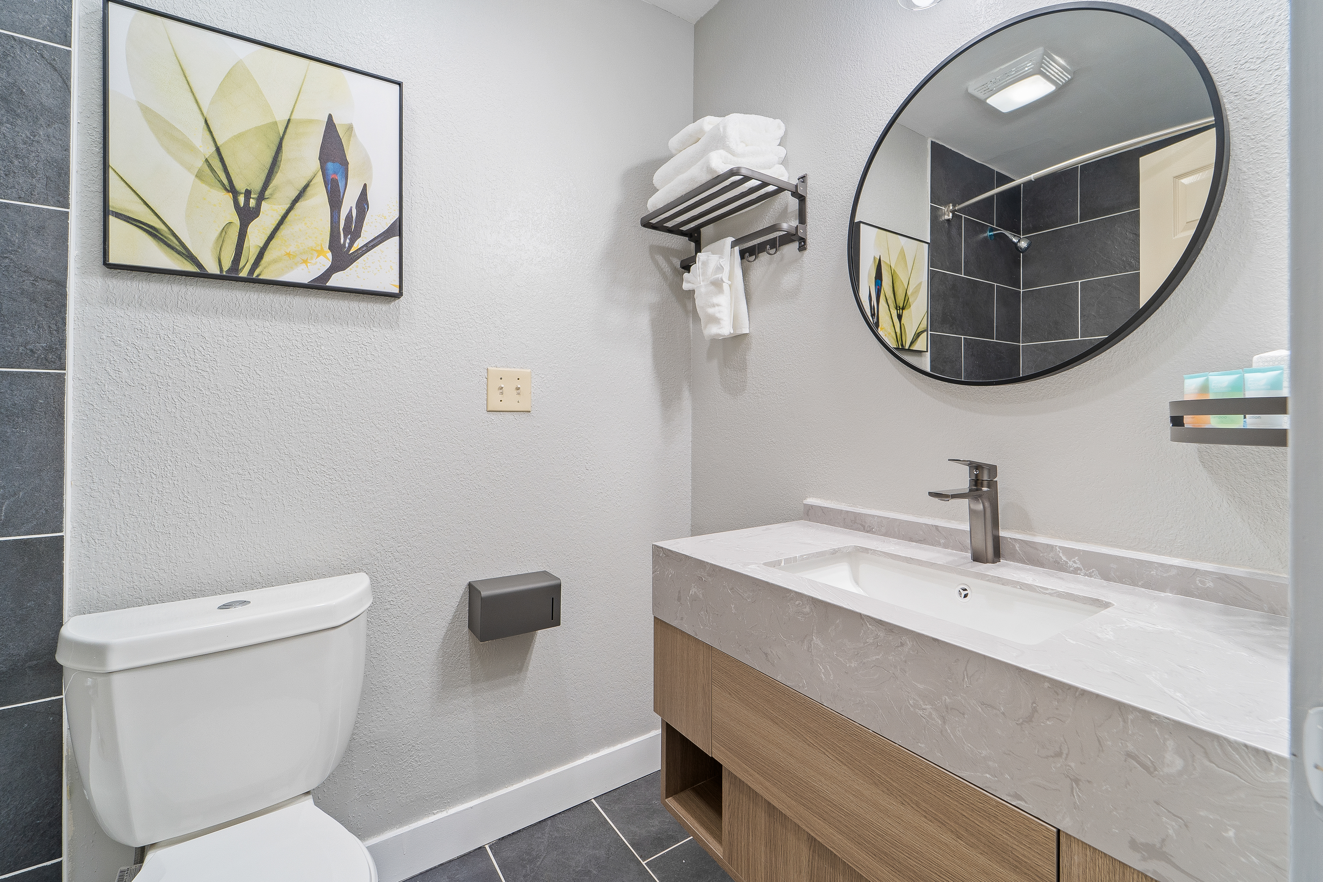 Guest room bath at the Interurban Suites Hotel, a Dazzler Select by Wyndham in Tukwila, Washington