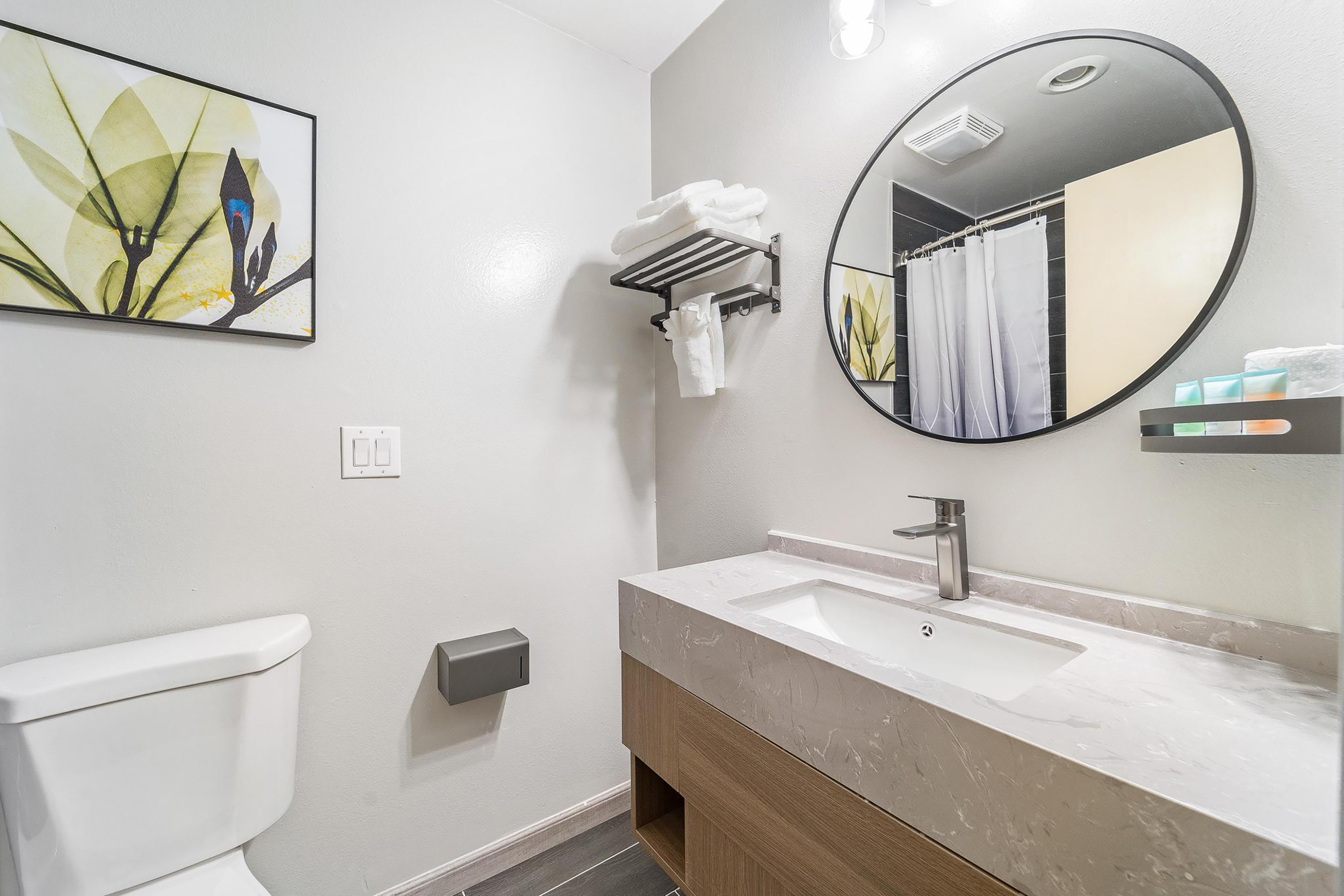 Guest room bath at the Interurban Suites Hotel, a Dazzler Select by Wyndham in Tukwila, Washington