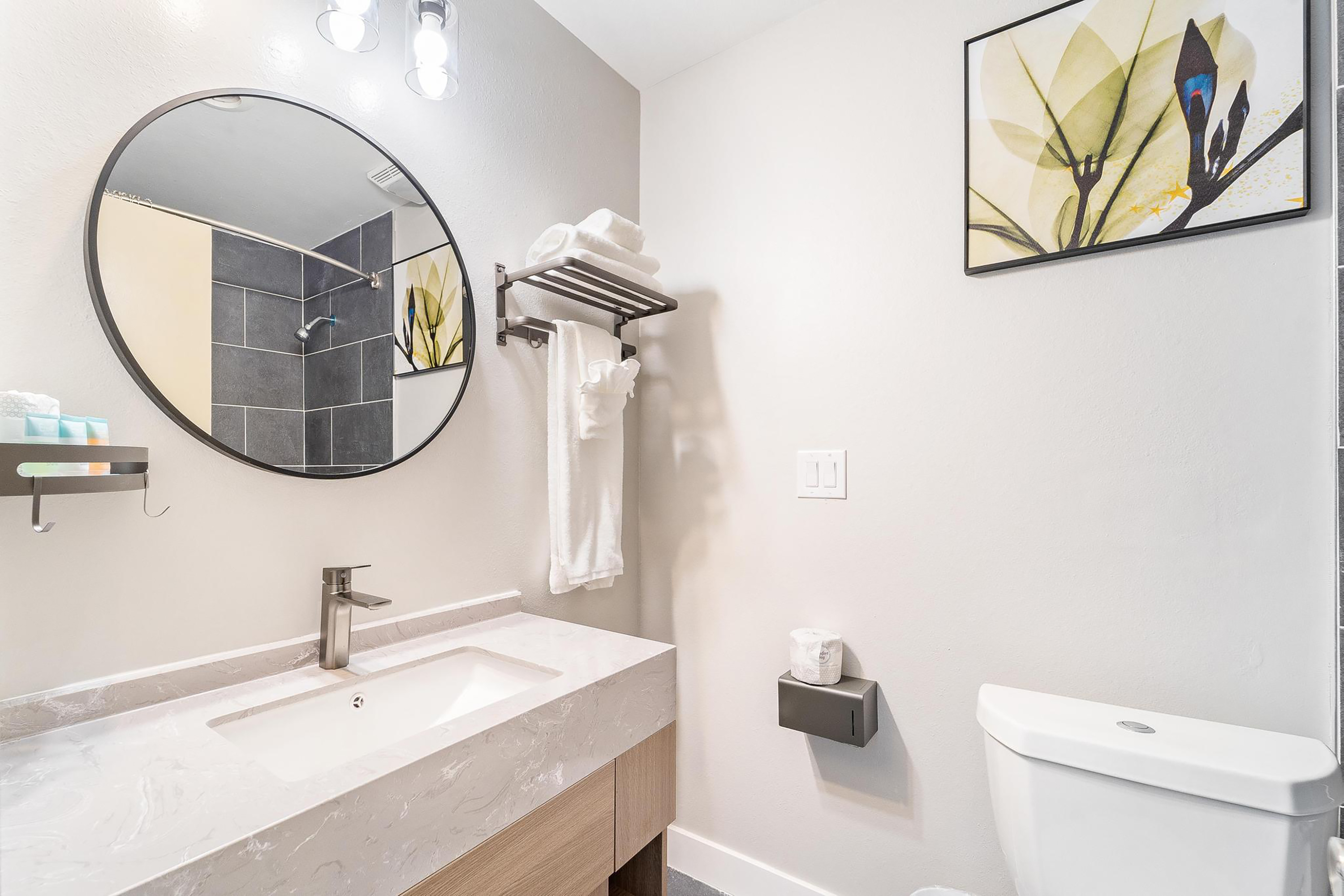 Guest room bath at the Interurban Suites Hotel, a Dazzler Select by Wyndham in Tukwila, Washington