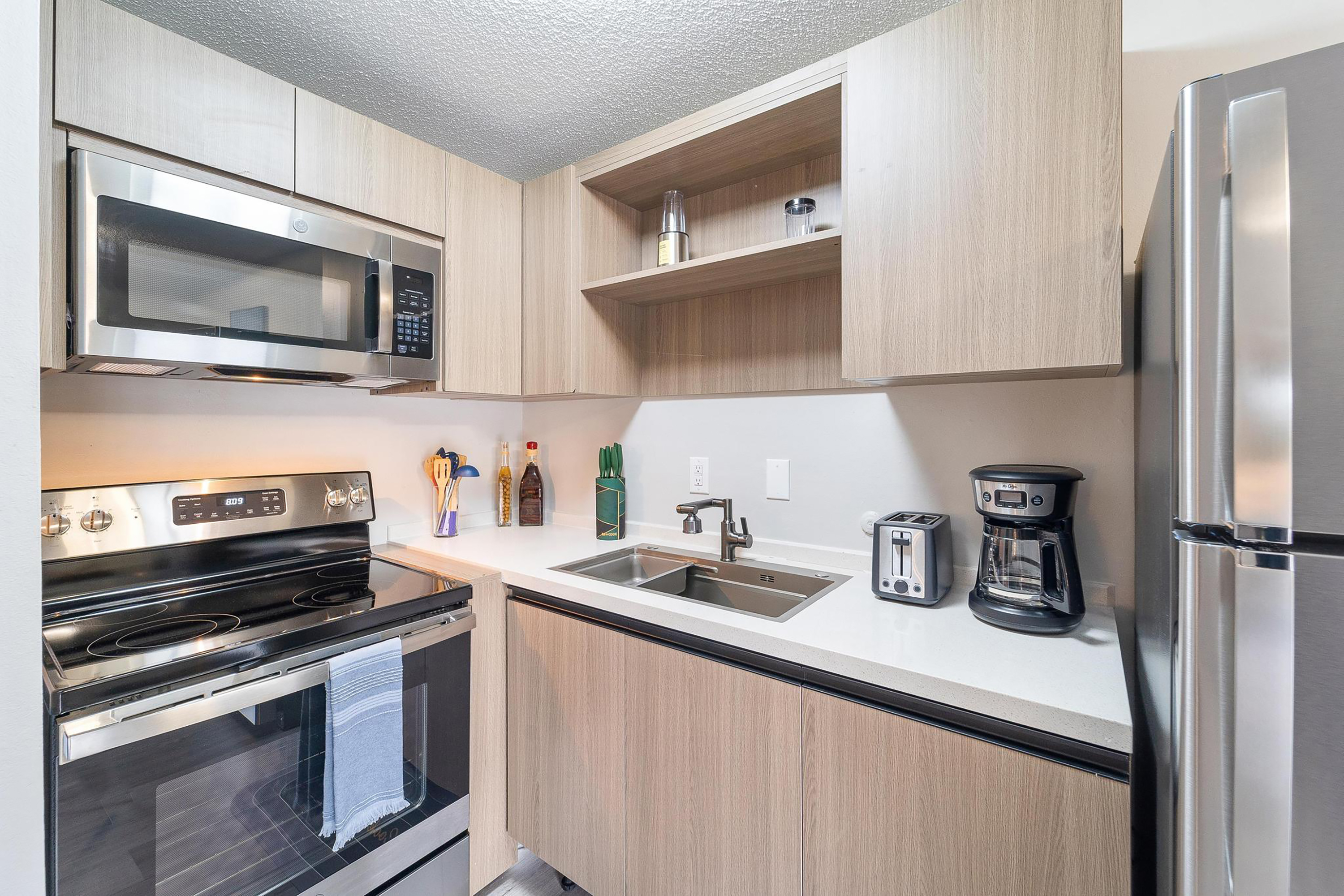Guest room at the Interurban Suites Hotel, a Dazzler Select by Wyndham in Tukwila, Washington