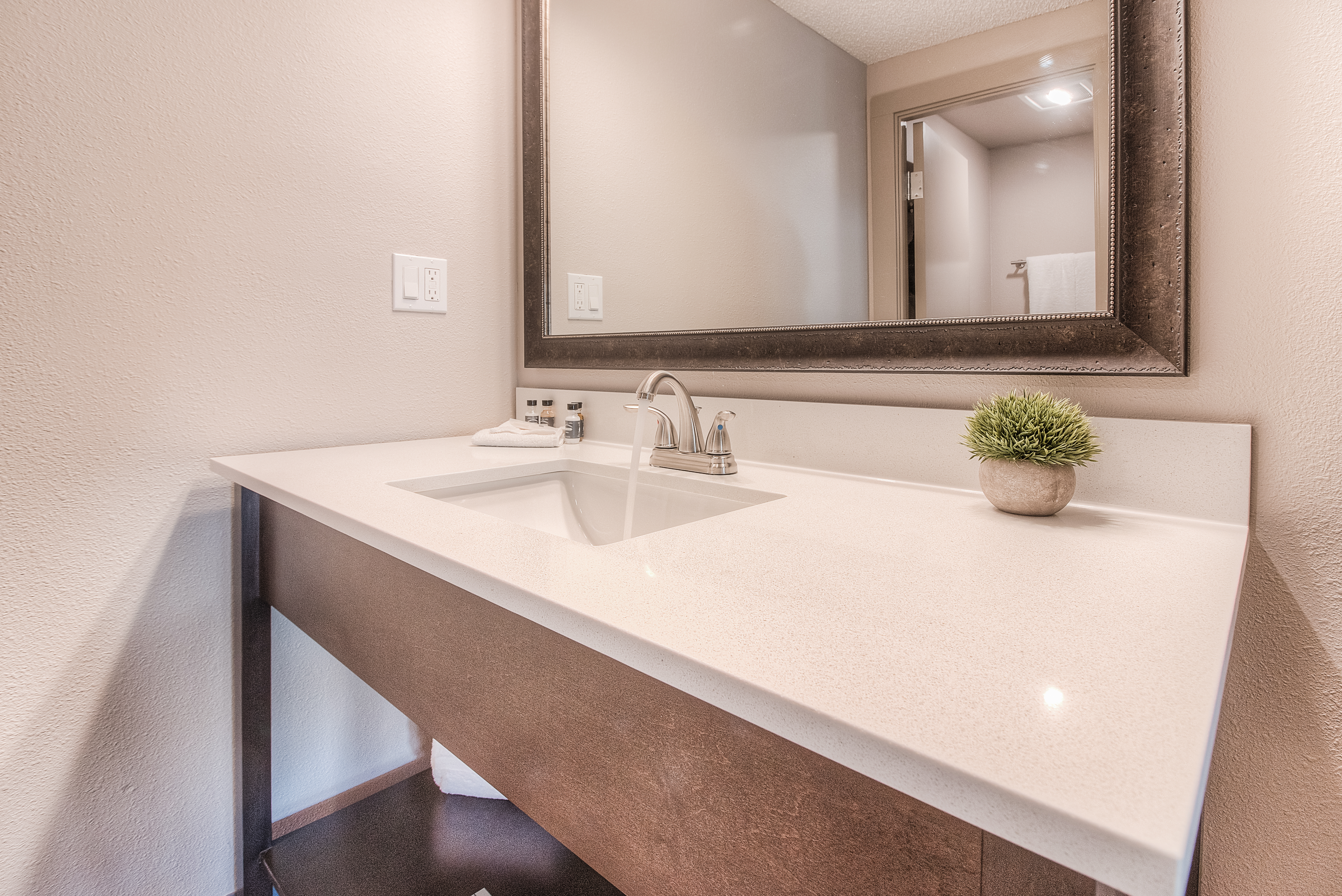 Guest room bath at the The Hotel Y, a Dazzler Select by Wyndham in Yakima, Washington