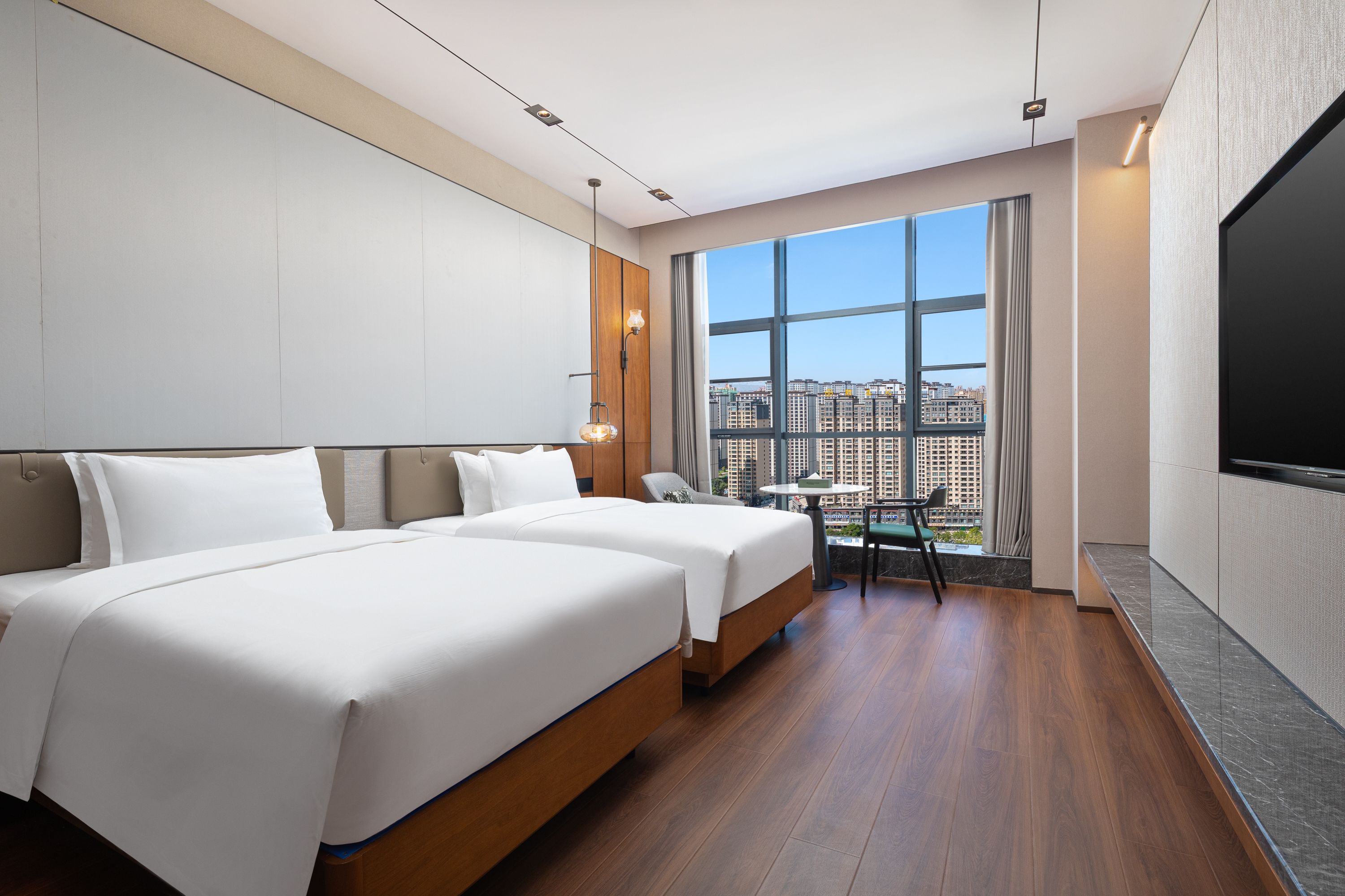 Guest room at the Wyndham Garden Linxia Downtown in Linxia, Other than US/Canada