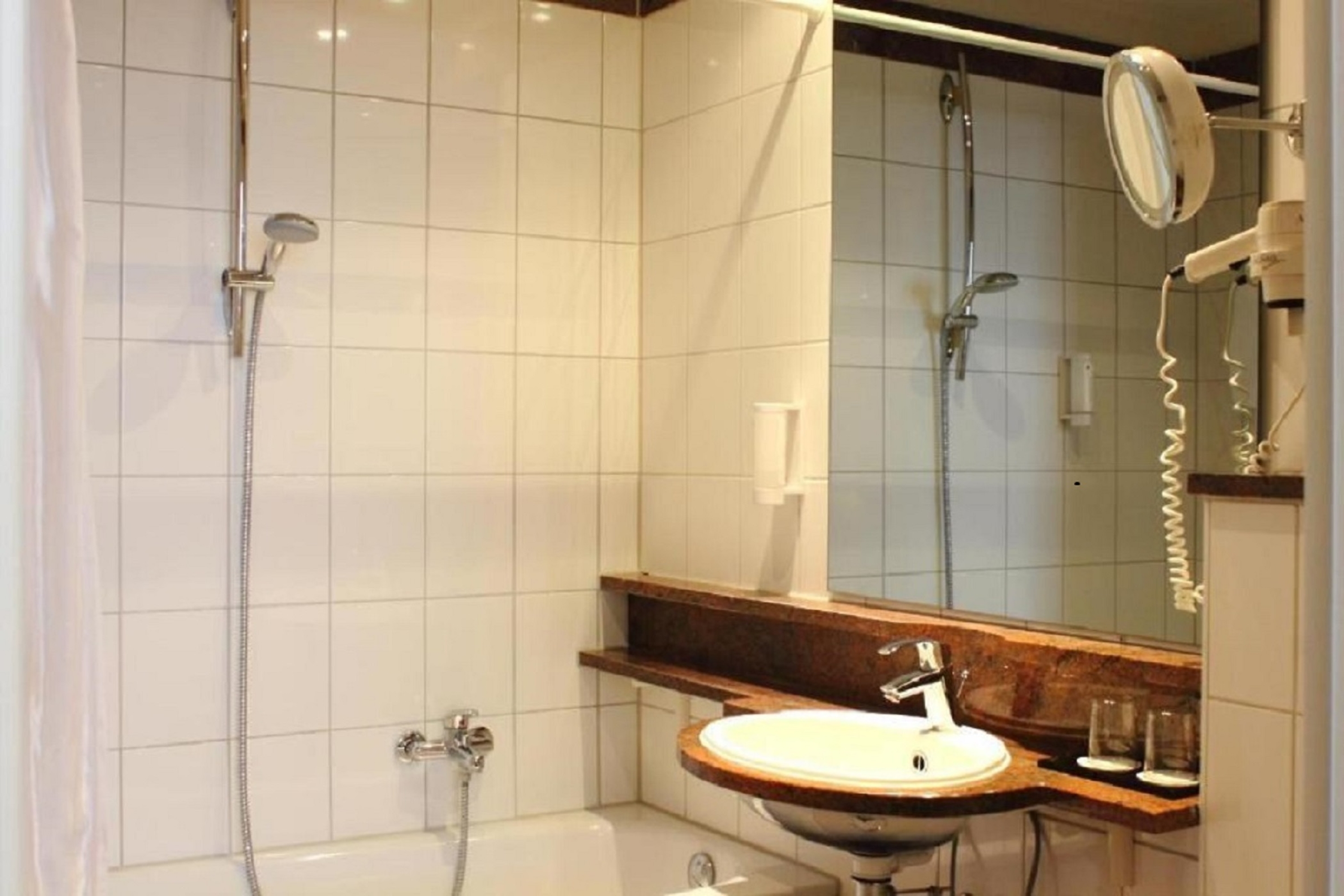 Guest room bath at the Wyndham Garden Berlin Mitte in Berlin, Other than US/Canada