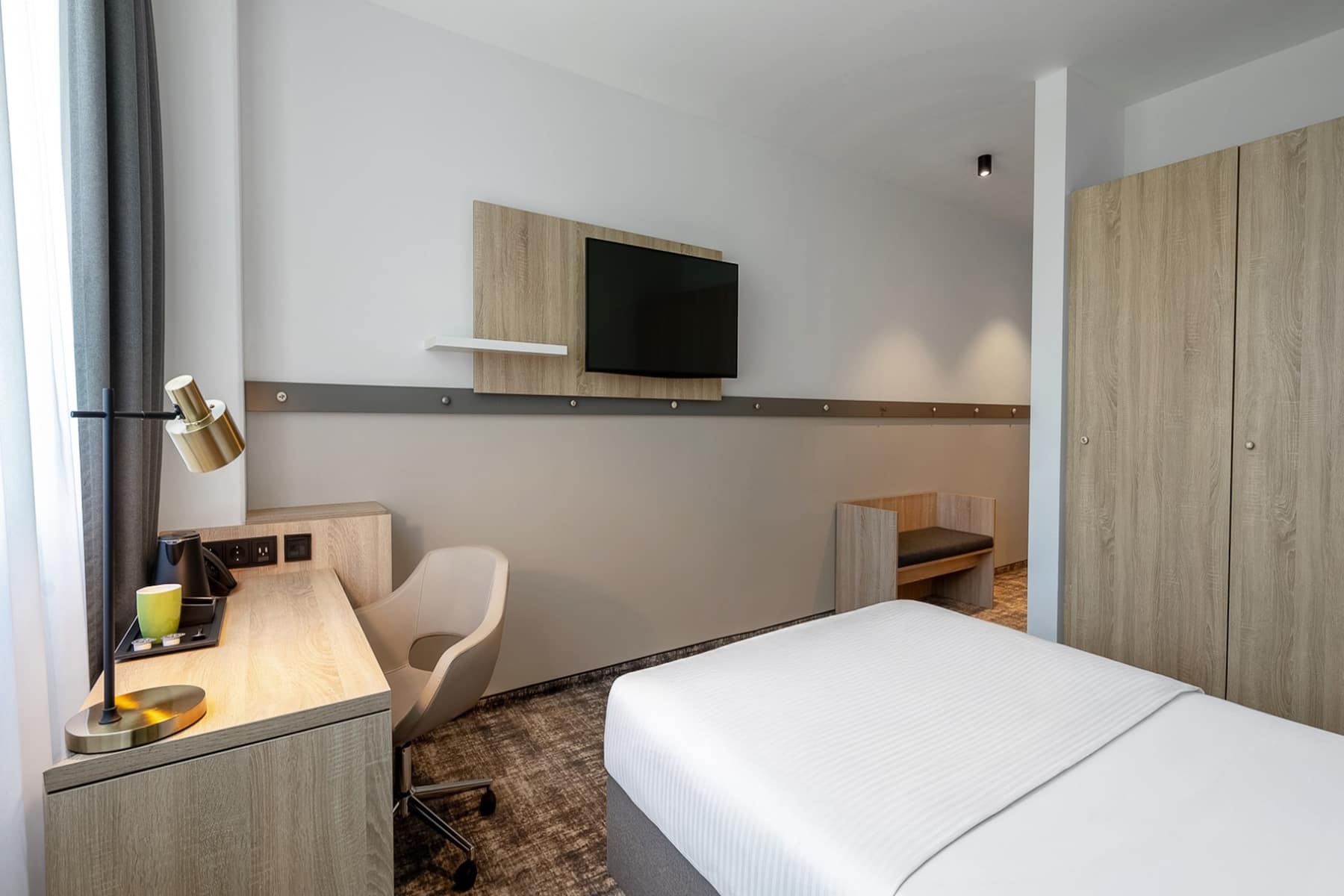 Guest room at the Wyndham Garden Munich Messe in Munich, Other than US/Canada