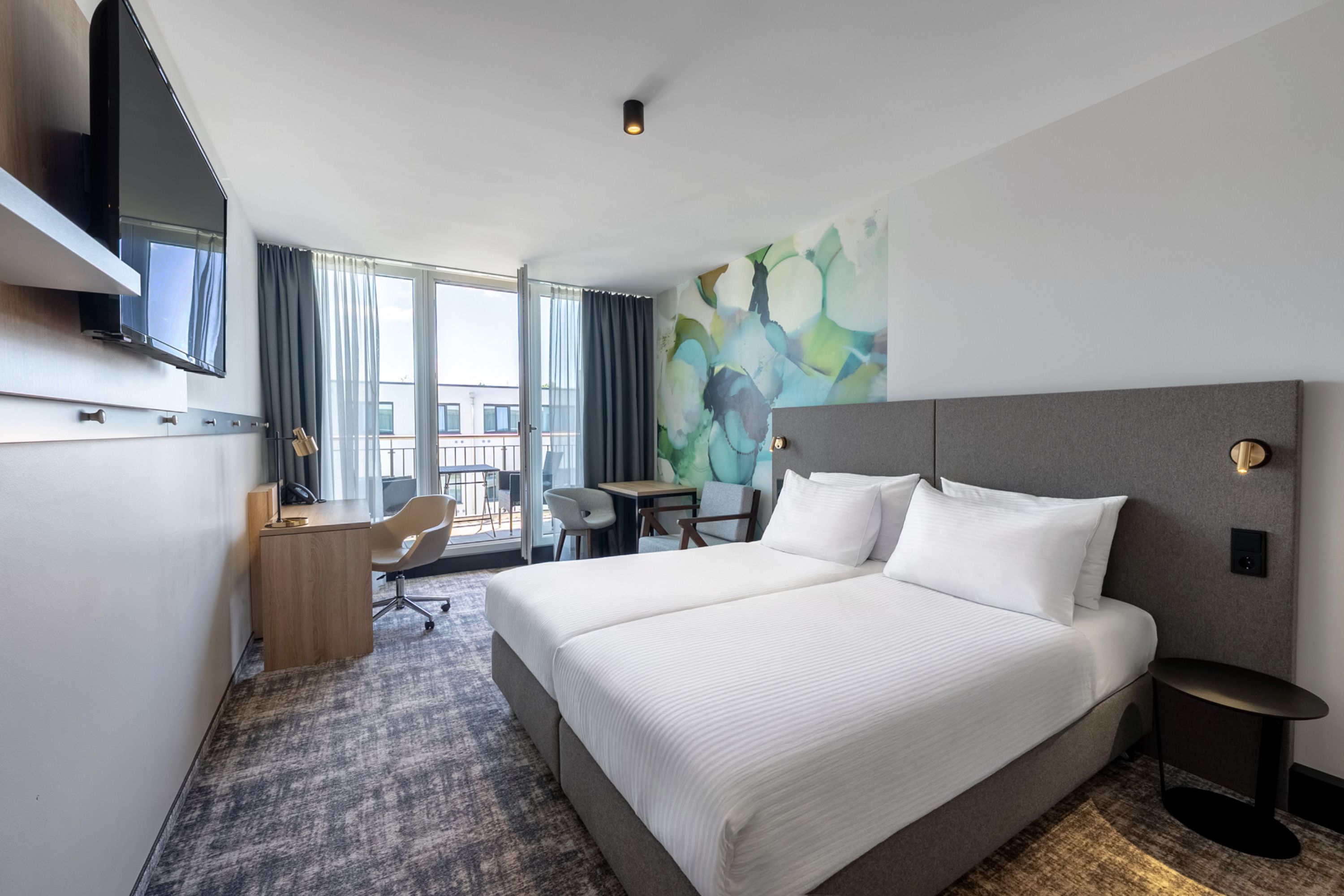 Guest room at the Wyndham Garden Munich Messe in Munich, Other than US/Canada