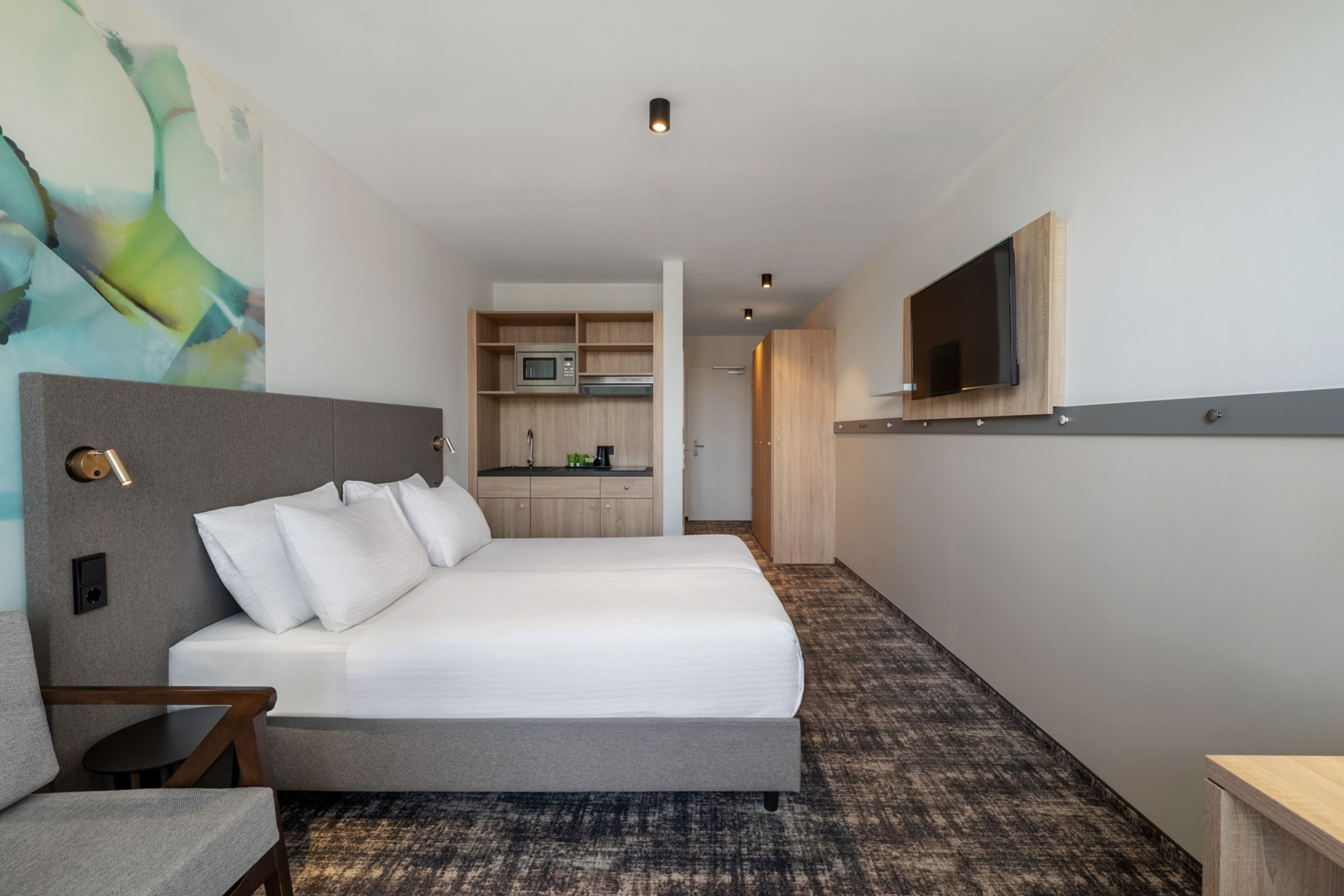 Guest room at the Wyndham Garden Munich Messe in Munich, Other than US/Canada