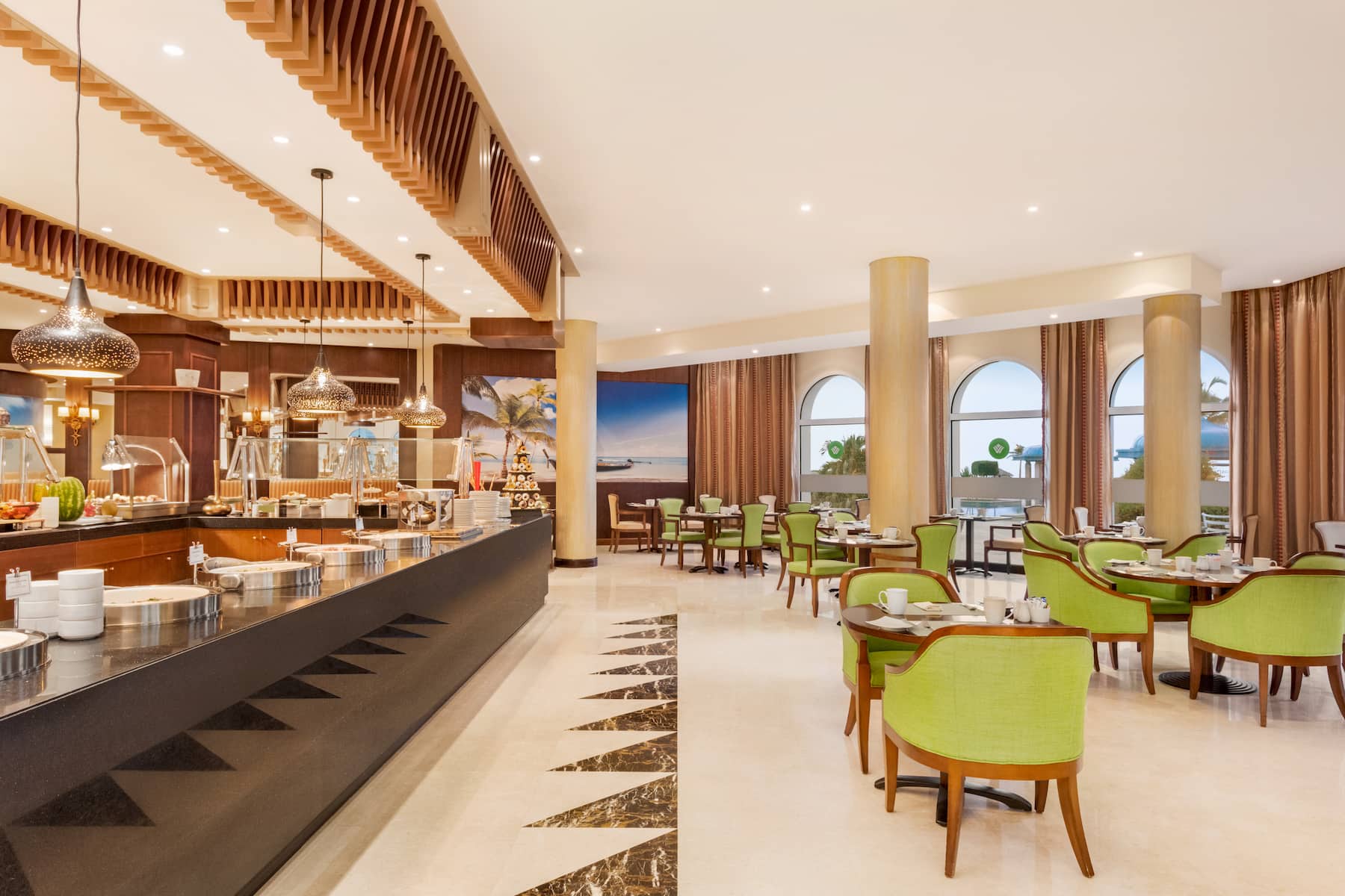 Wyndham Garden Salalah Mirbat restaurant breakfast area with seating in Salalah, Other than US/Canada