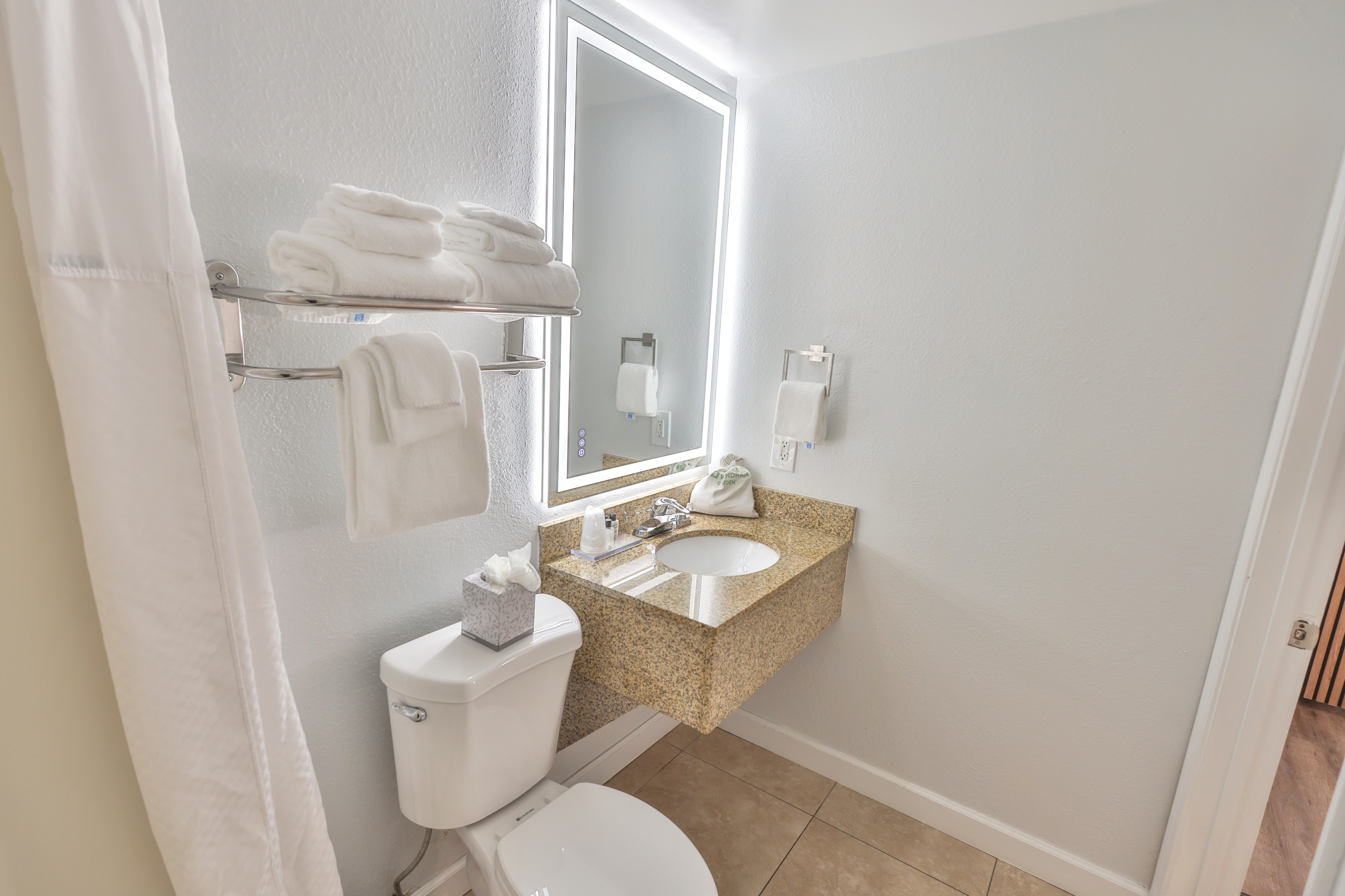 Guest room bath at the Wyndham Garden Fort Walton Beach Destin in Fort Walton Beach, Florida
