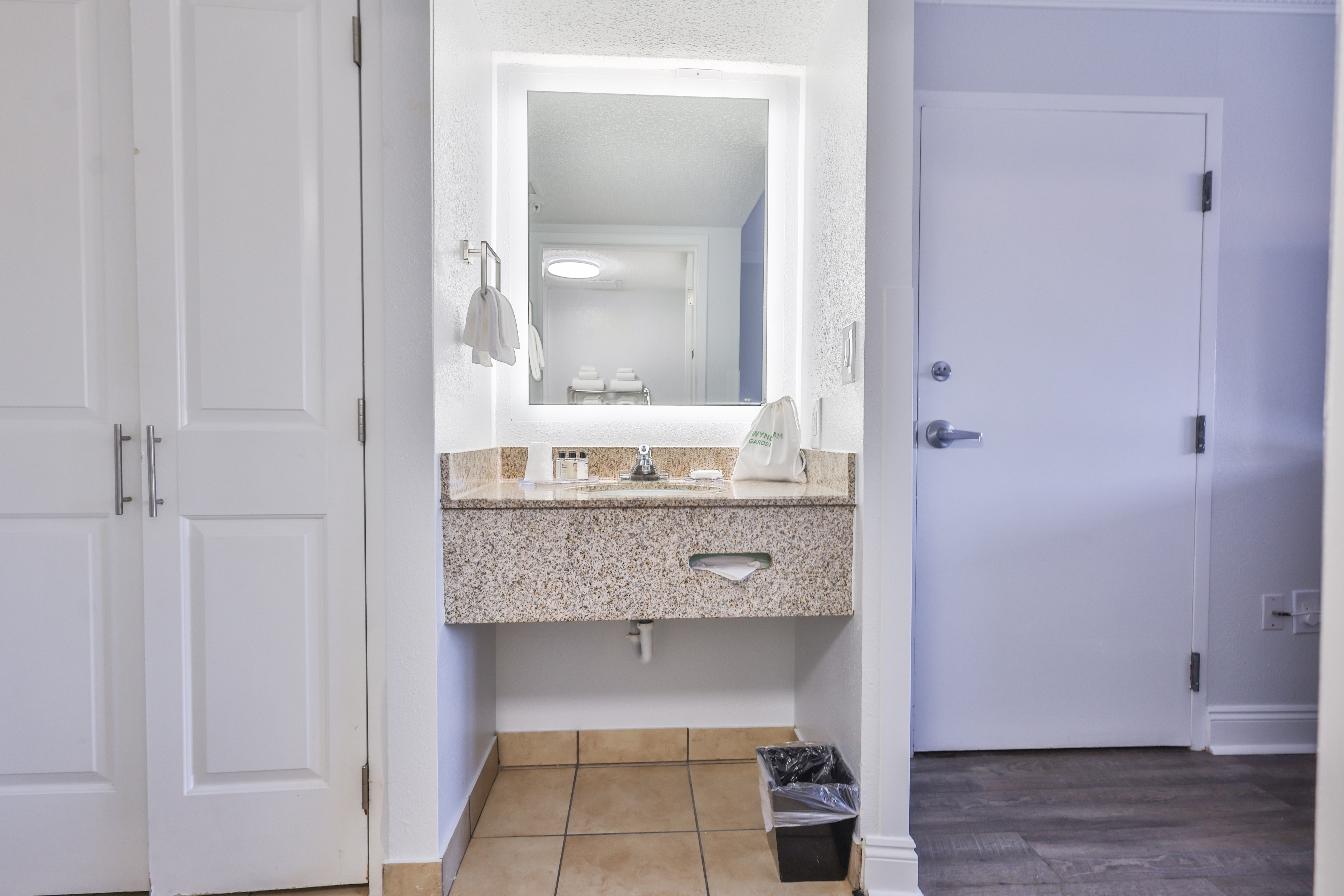 Guest room bath at the Wyndham Garden Fort Walton Beach Destin in Fort Walton Beach, Florida