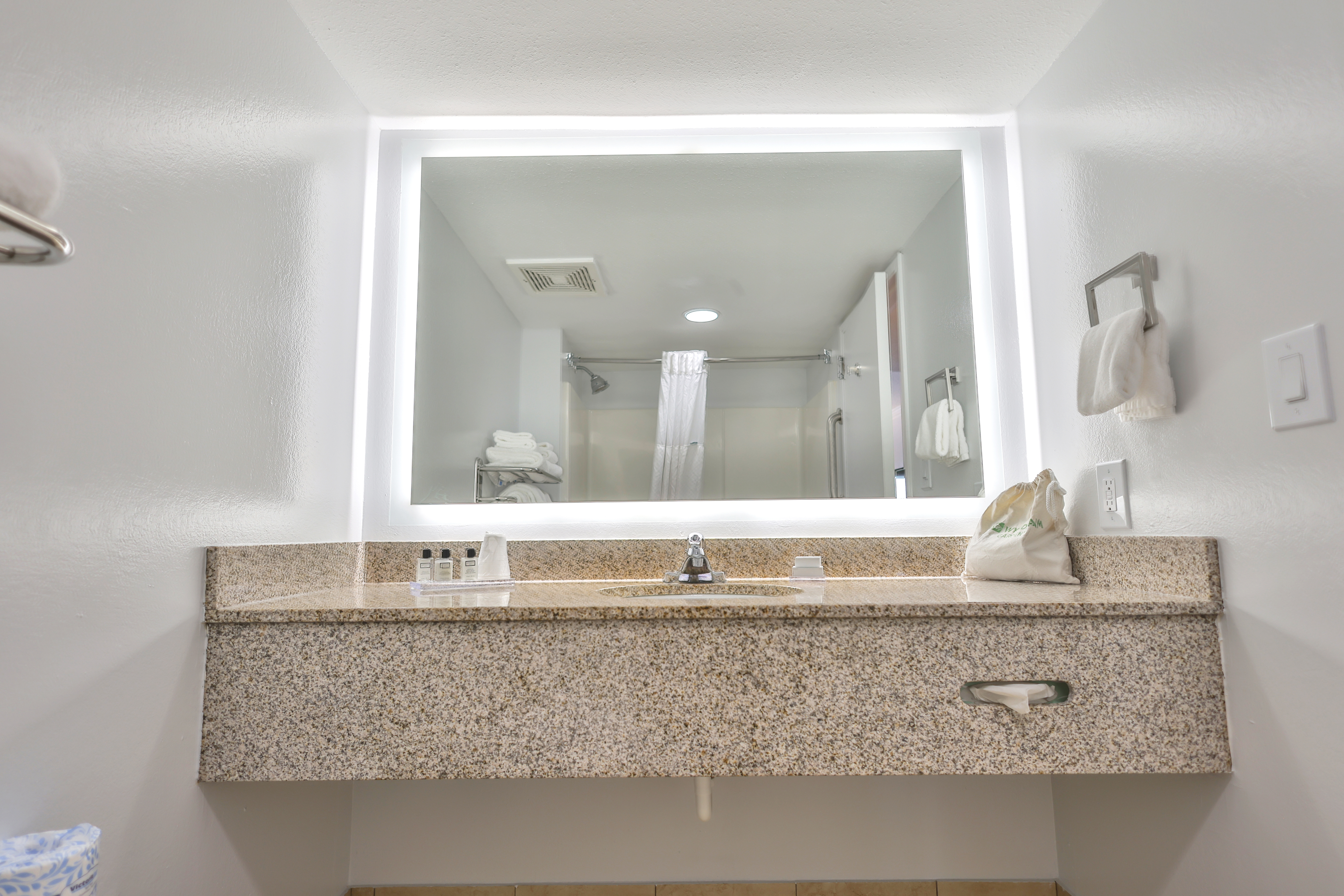 Guest room bath at the Wyndham Garden Fort Walton Beach Destin in Fort Walton Beach, Florida