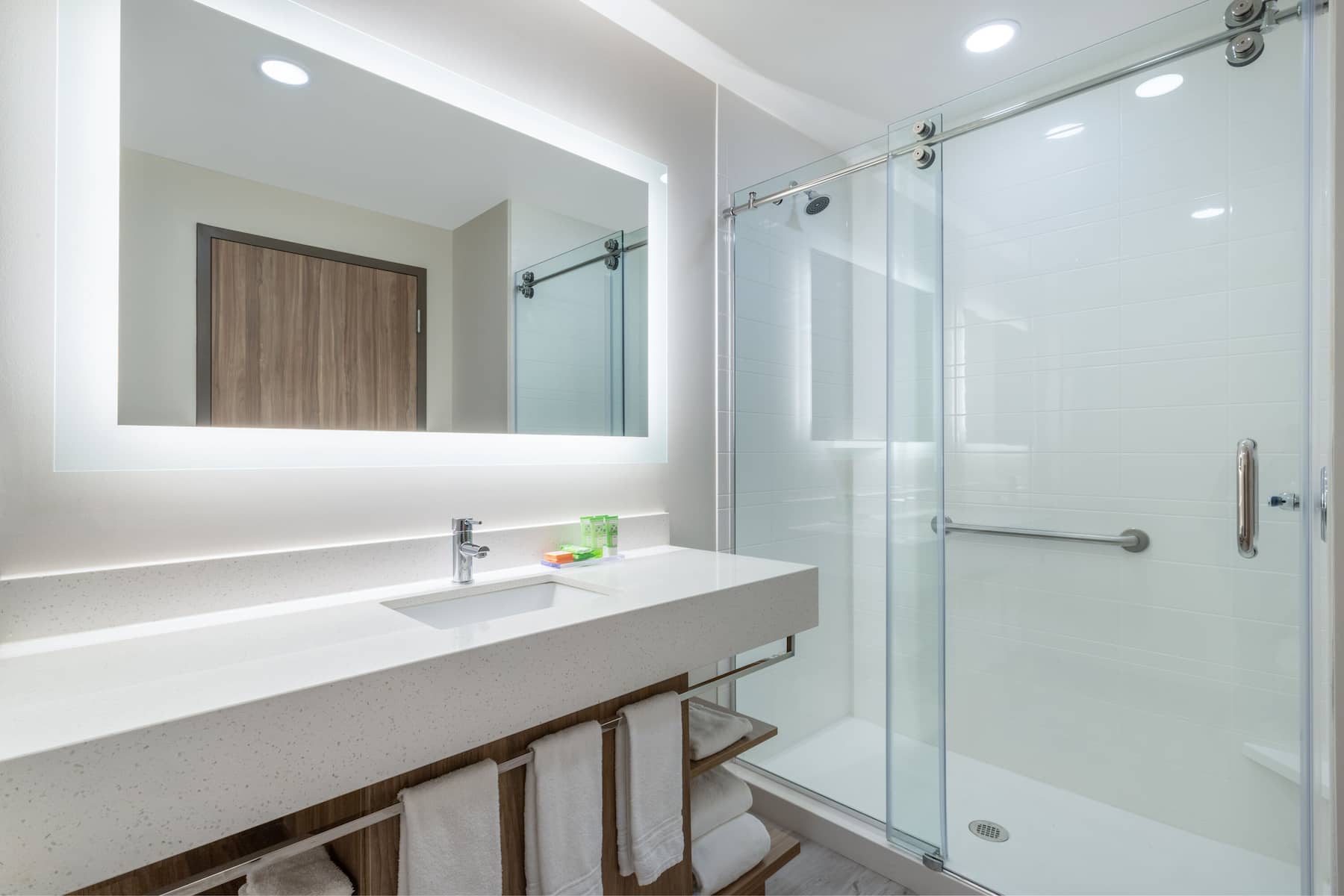 Guest room bath at the Wyndham Garden Orlando Airport in Orlando, Florida