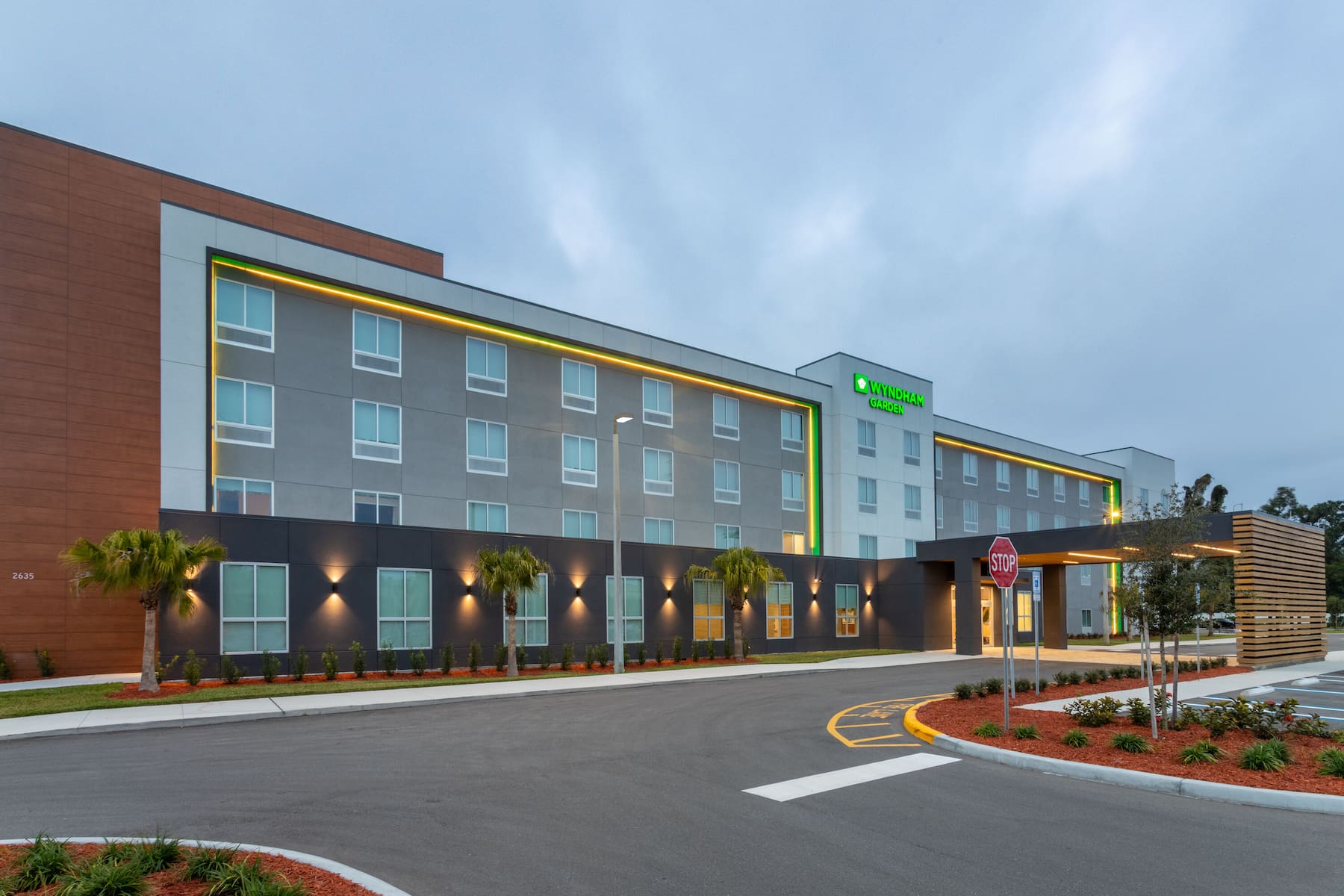 Exterior Dusk Image of Wyndham Garden Orlando Airport hotel in Orlando, Florida